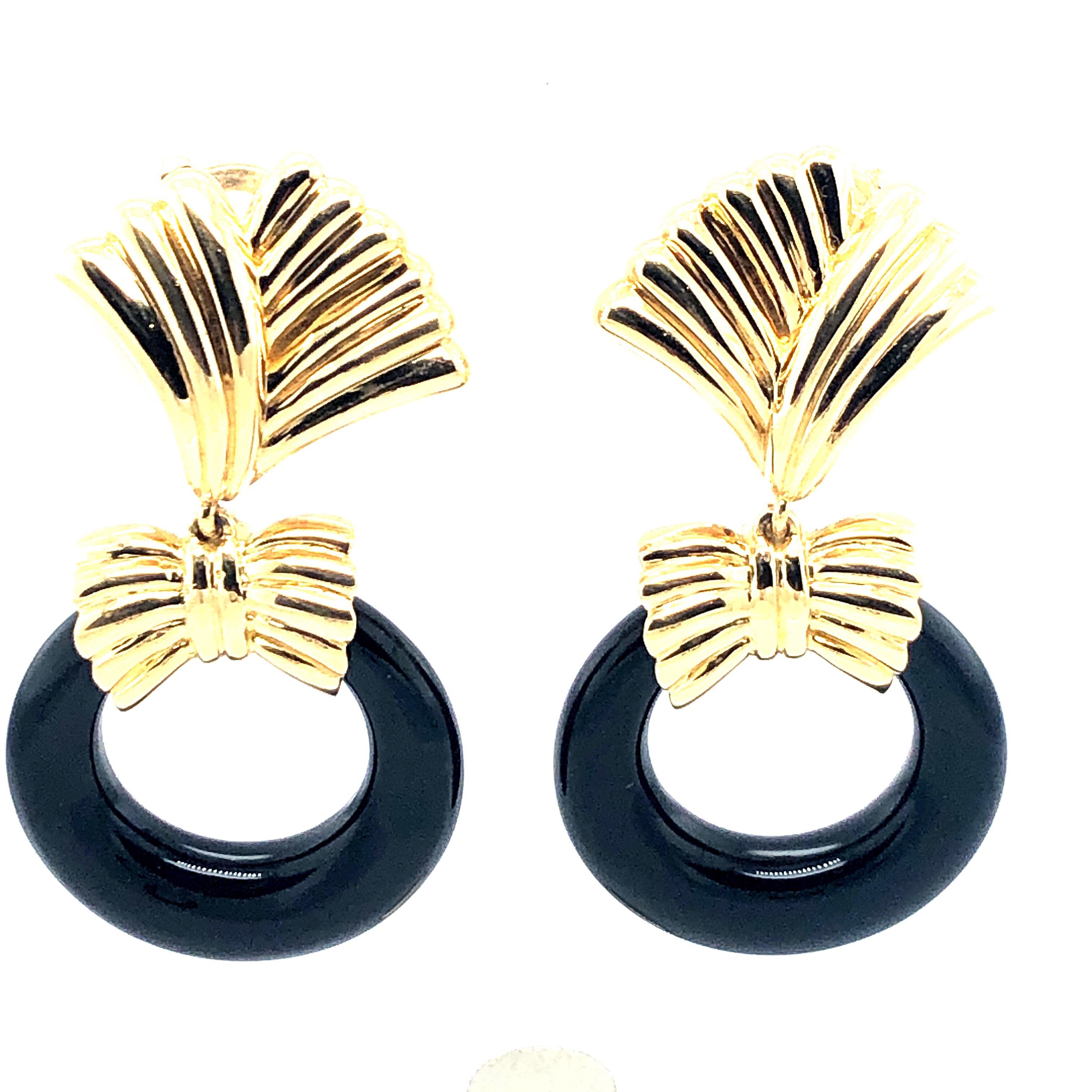 Three for one!  These gorgeous vintage Van Cleef and Arpels Earrings hold three different looks.  You can have the gold earrings with the gold and diamond drop or circle charm, the black or pearly white for a wonderful day look.  Stamped VCA and 18K