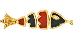 Van Cleef & Arpels Coral Black Onyx 18 Karat Gold Articulated Fish Bracelet