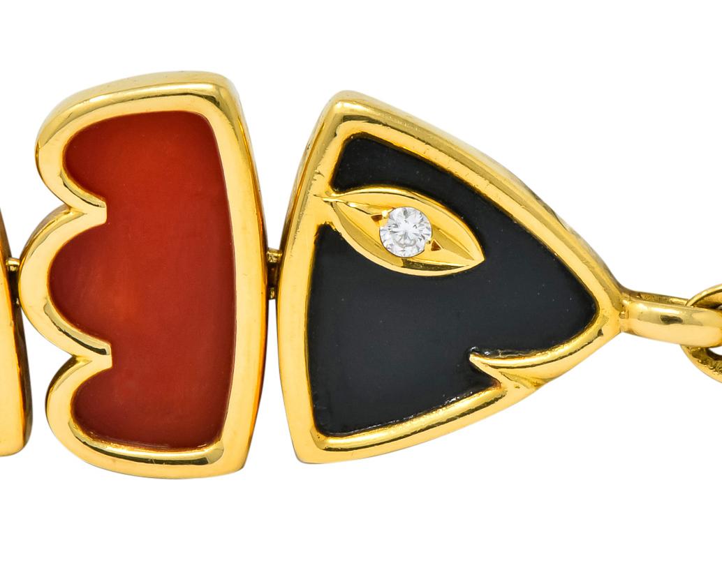 Modernist Van Cleef & Arpels Coral Black Onyx 18 Karat Gold Articulated Fish Bracelet