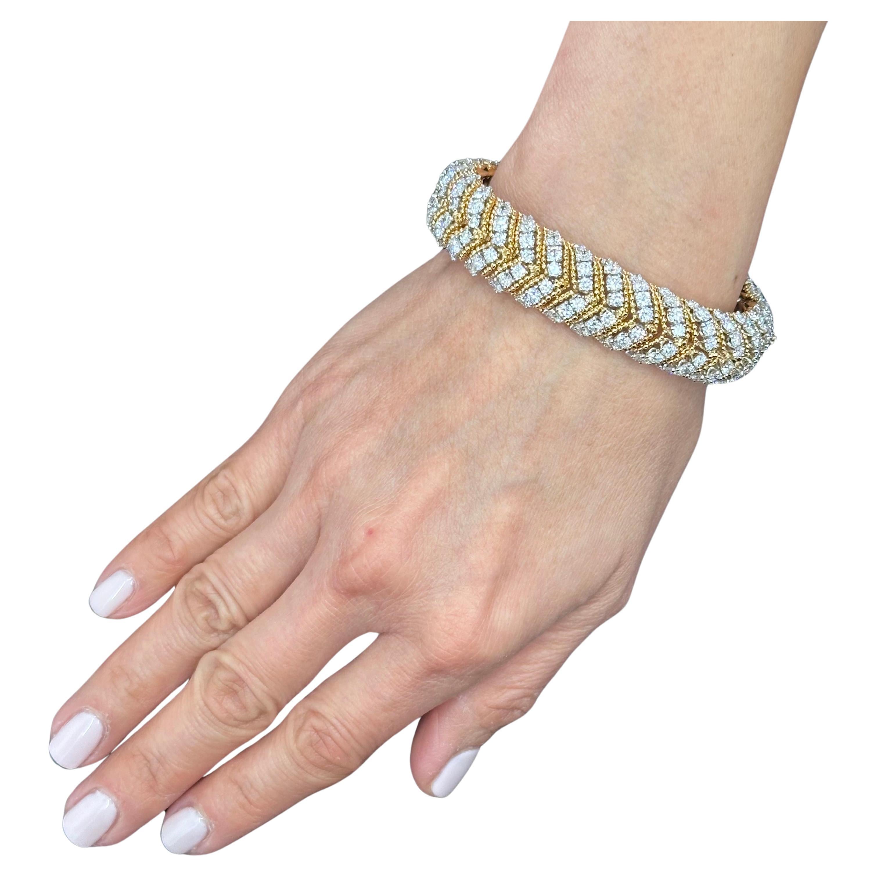 Van Cleef And Aprels Diamond , Yellow Gold and Platinum Bracelet Signed and numbered 
Diamond: Est. 20 cts  of D E VVS Quality Diamonds, 
Signed Van Cleef and Arpels with Numbers NY xxxx
circa 1960s, 
Length: 7.25 inches 
Width: 1/2 Inches
Well