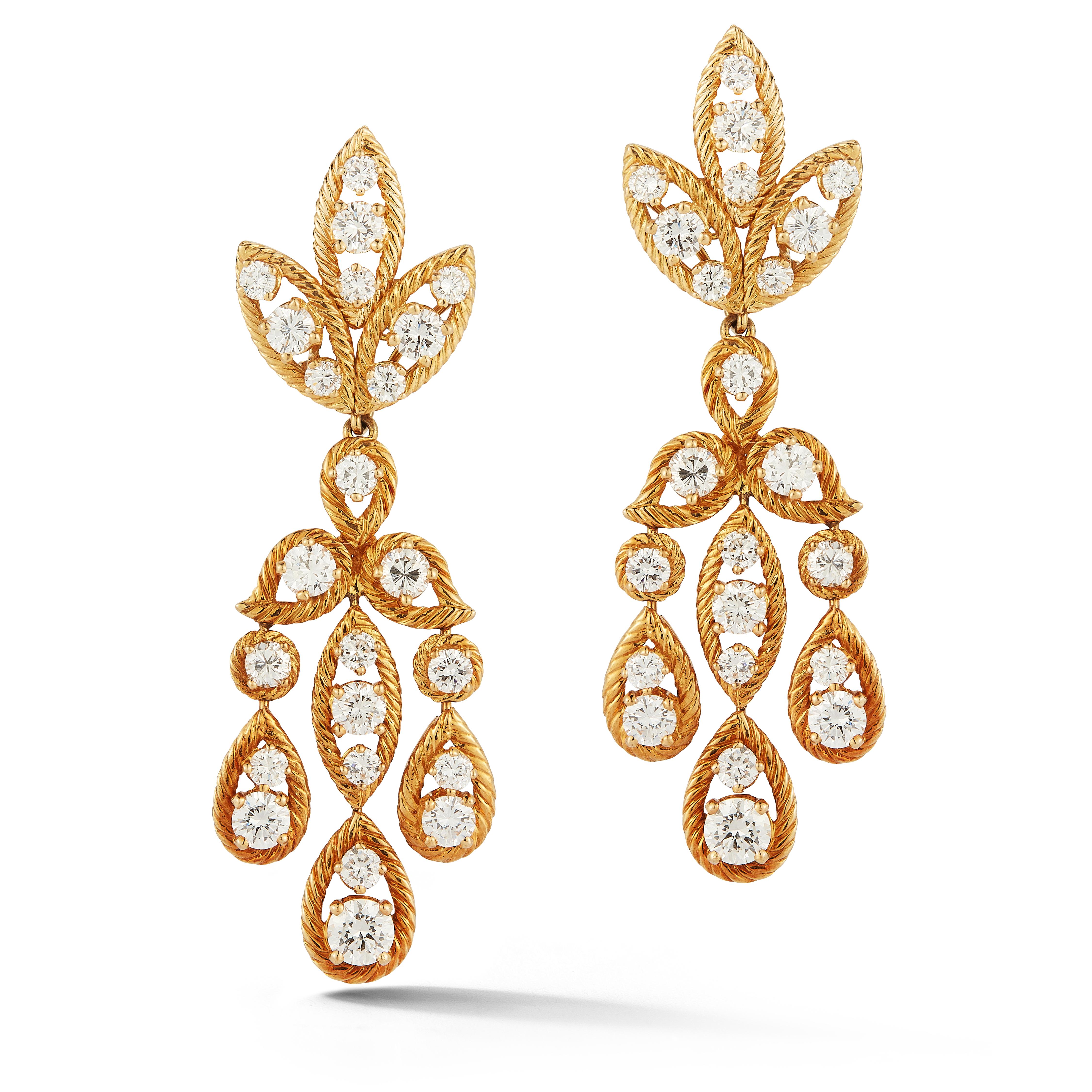 Van Cleef and Arpels Diamond Chandelier Earrings 

 18k yellow gold.

Back Type: Clip On with post 

Signed, Van Cleef & Arpels & numbered

Measurements: 2.15