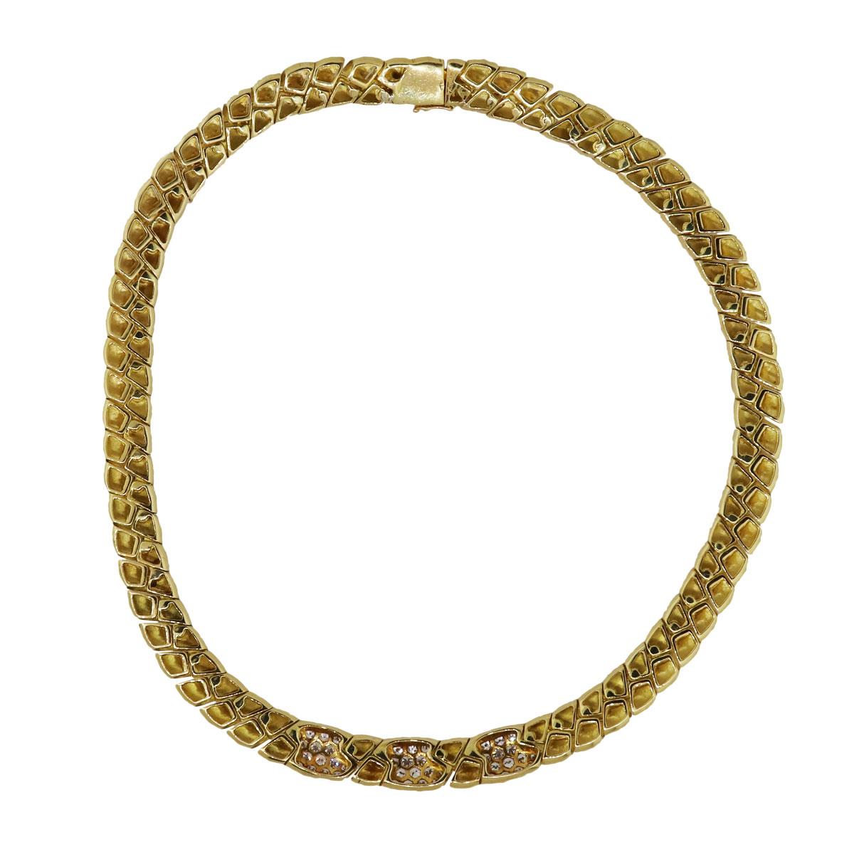 Material: 18k yellow gold
Diamond Details: Approximately 2ctw of round brilliant diamonds. Diamonds are G/H in color and VS in clarity.
Measurements: Necklace measures 16″ in length.
Fastening: Tongue in box clasp with safety latch
Item Weight: