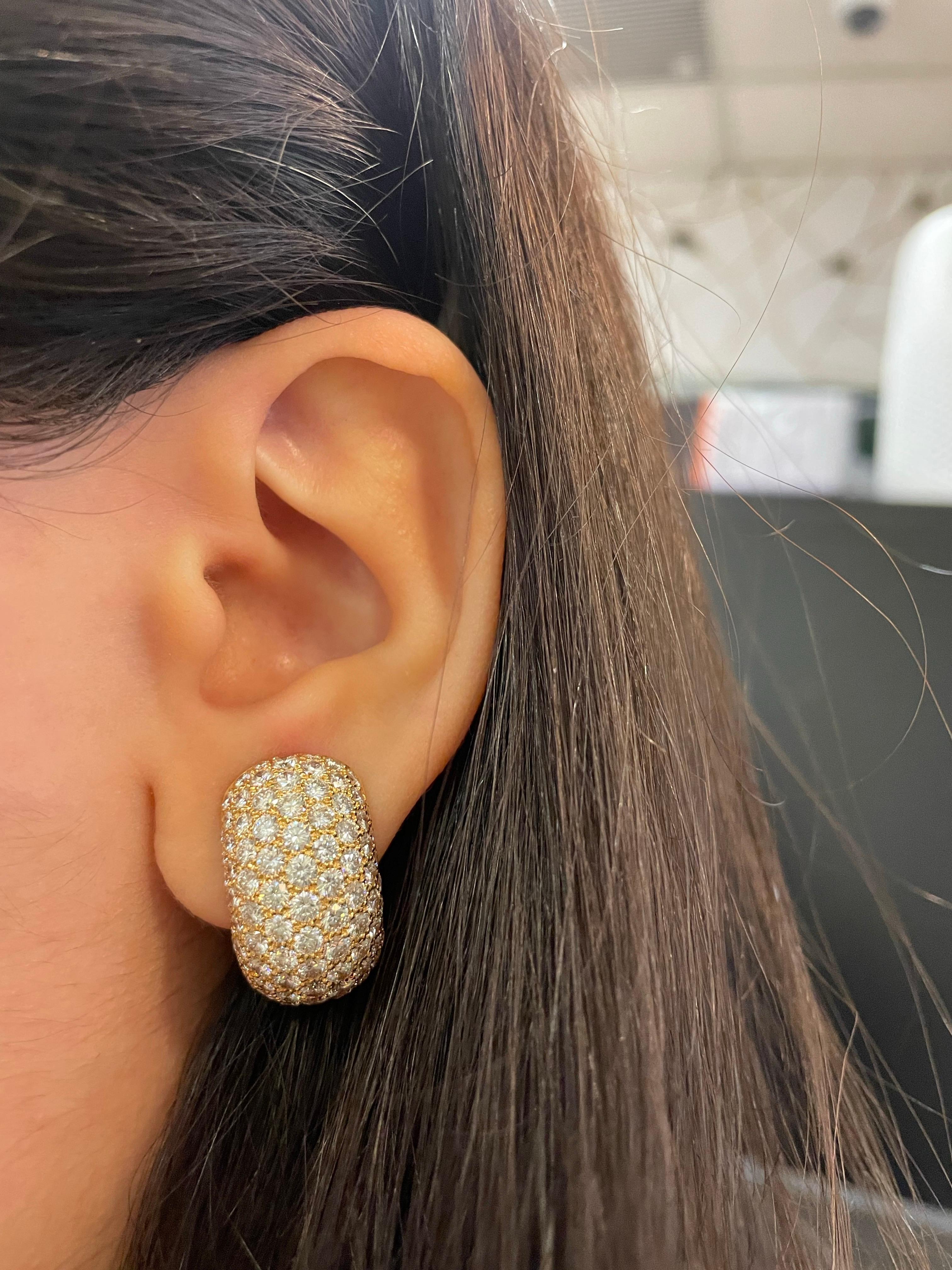 Van Cleef and Arpels Diamond Earrings 

A pair of dome-shaped yellow gold earrings by Van Cleef and Arpels, featuring a pavé setting of round-cut diamonds.

Total Approximate Diamond Weight: 10 carats
Approximate Length: 1 inch
Signed: VCA and