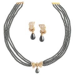 Van Cleef and Arpels ensemble collier et boucles d'oreilles en hématite et diamants