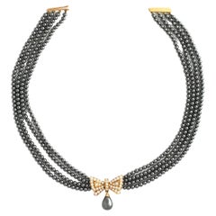 Van Cleef & Arpels Set di collana e orecchini con diamanti e ematite