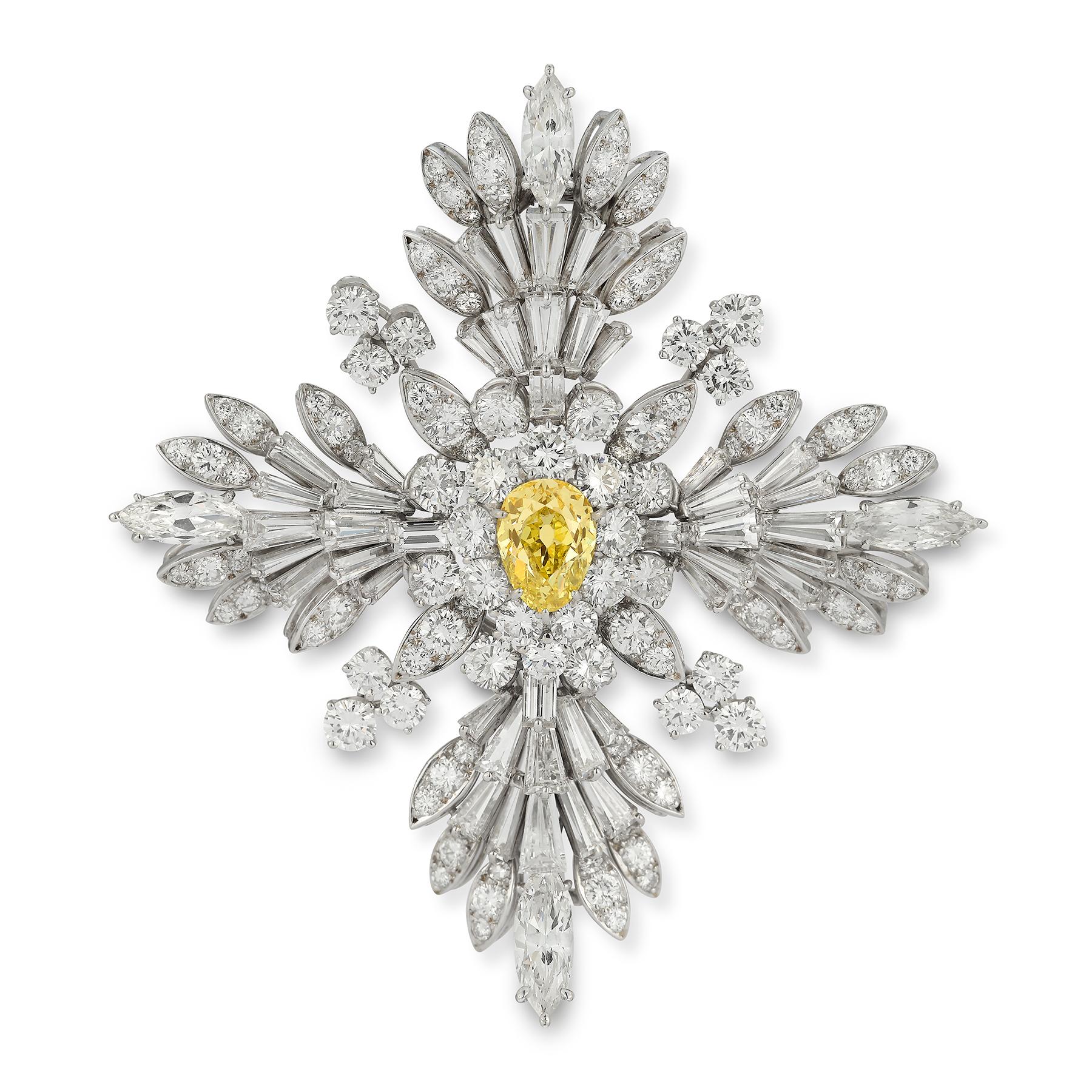 Van Cleef and Arpels Fancy Intense Yellow Diamond Maltese Cross
 Brooch
A fancy yellow old mine pear shape center diamond surrounded by round, marquise & baguette cut diamonds set in platinum.

Center old mine pear shape yellow diamond weight: