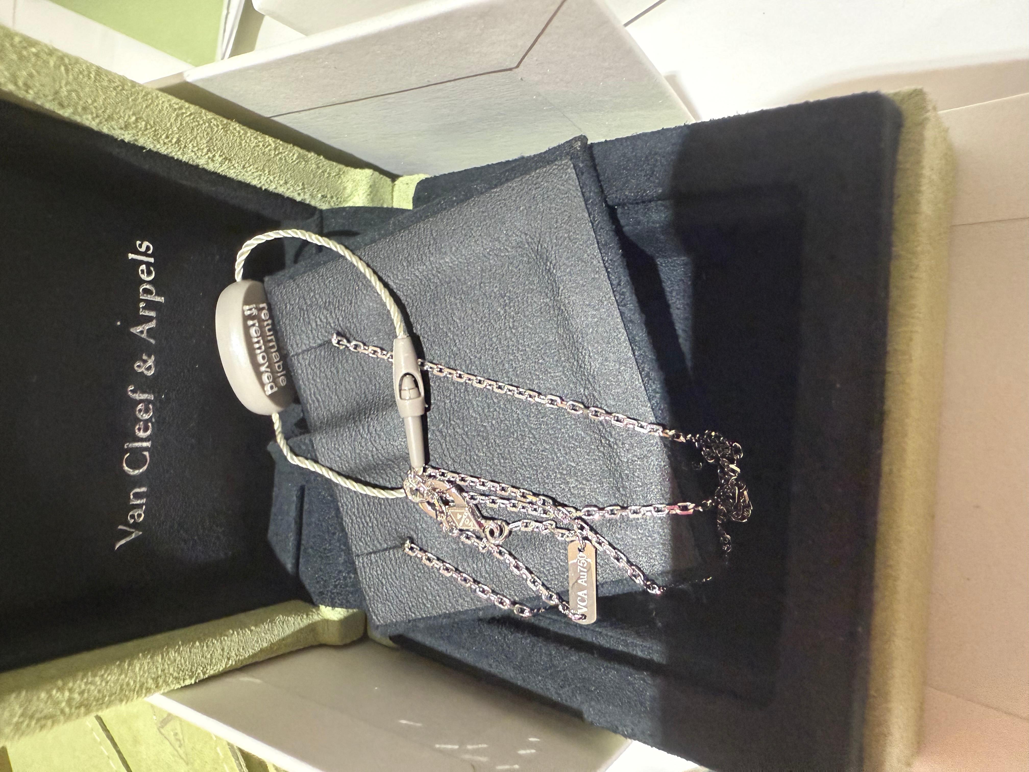 Brilliant Cut Van Cleef and Arpels holiday Alhambra pendant 2024 in Guilloche