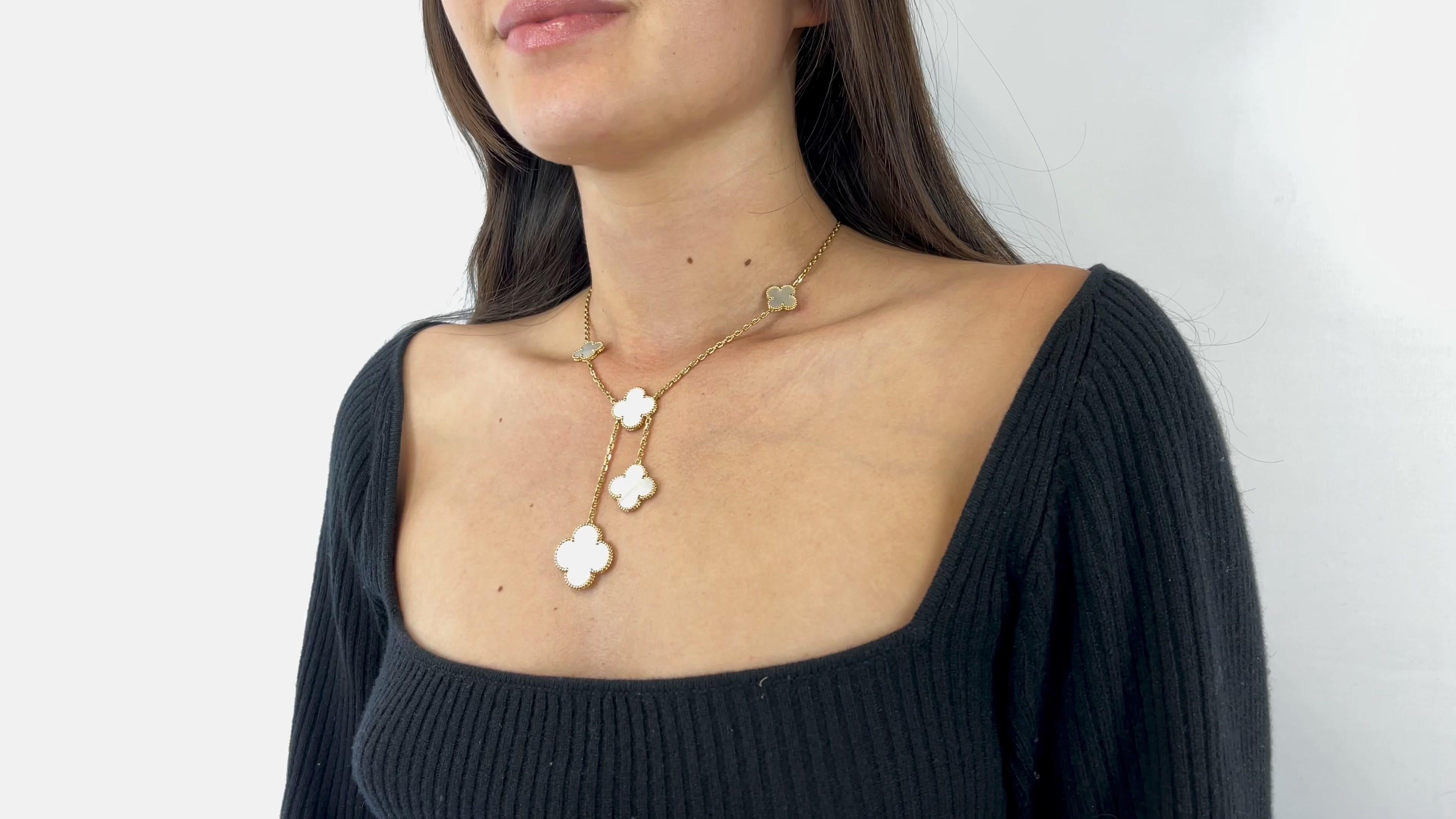 One Van Cleef and Arpels Magic Alhambra Mother of Pearl 18 Karat Gold Necklace. Featuring polished mother of pearl. Crafted in 18 karat yellow gold signed VCA. Circa 2010s. The necklace measures 15 inches in length. 

About The Piece: The rare