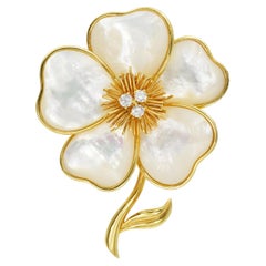 Van Cleef and Arpels MOP and diamond “Clematite” brooch in