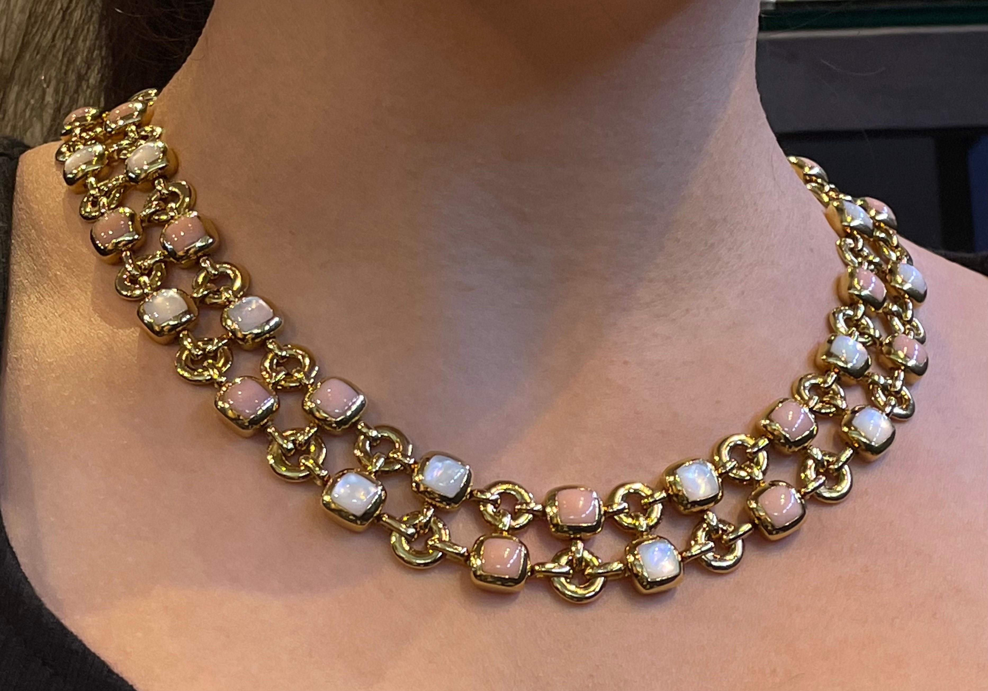 Van Cleef and Arpels Mother of Pearl and Angel Skin Coral gold necklace. 

A beautiful combination of mother of pearl and coral in this vintage “Babylon” necklace. 

Signed: VCA with makers mark and numbered

Gold Type: 18 Karat Gold

Measures at