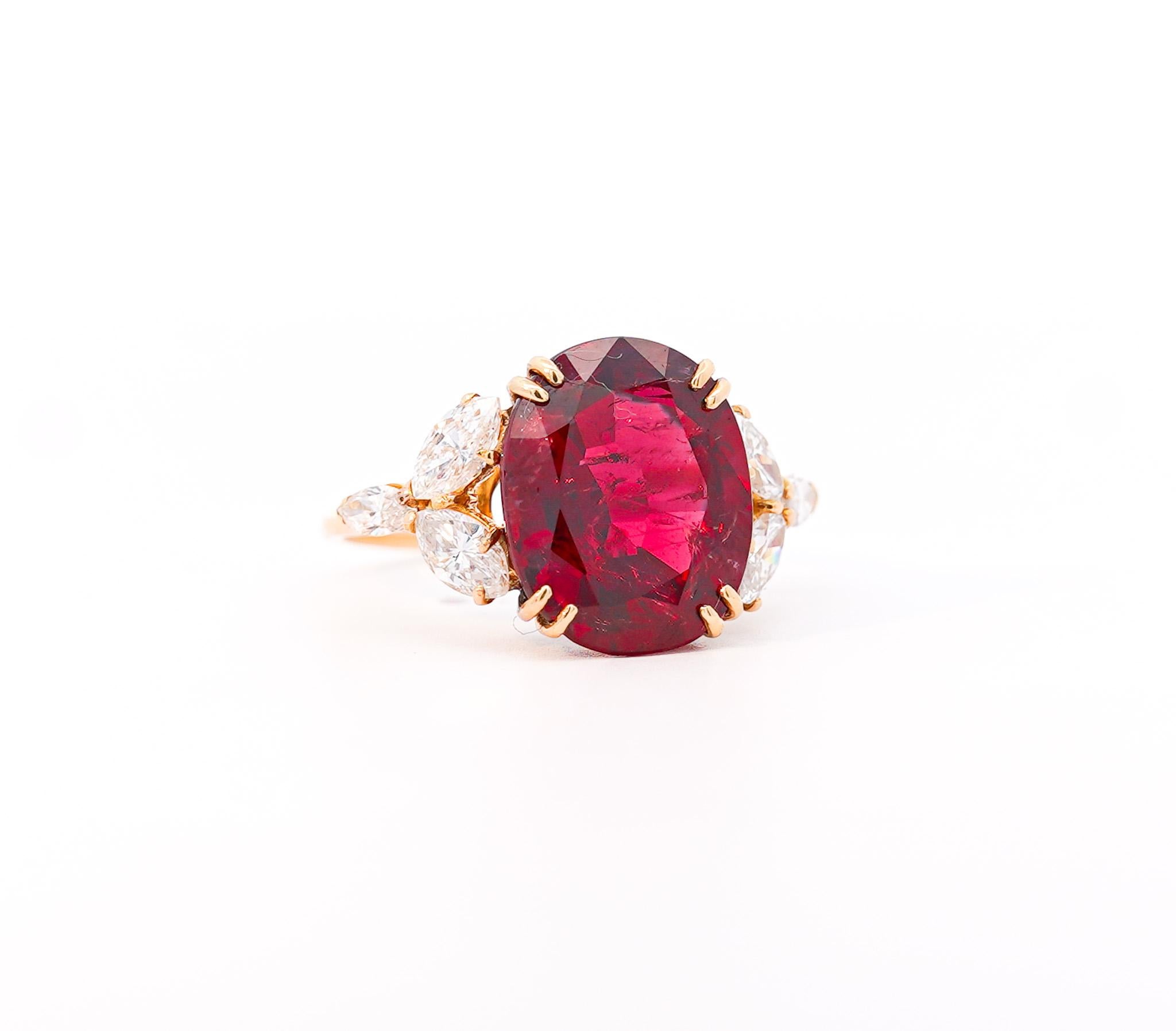 From the famed house of Van Cleef and Arpels, this ring centers an 8.85 carat oval-cut unheated Ruby and is flanked by an additional 2.00 carats of marquis-cut diamonds. The ruby is certified by GRS, while the ring is a signed VCA jewel.

The center