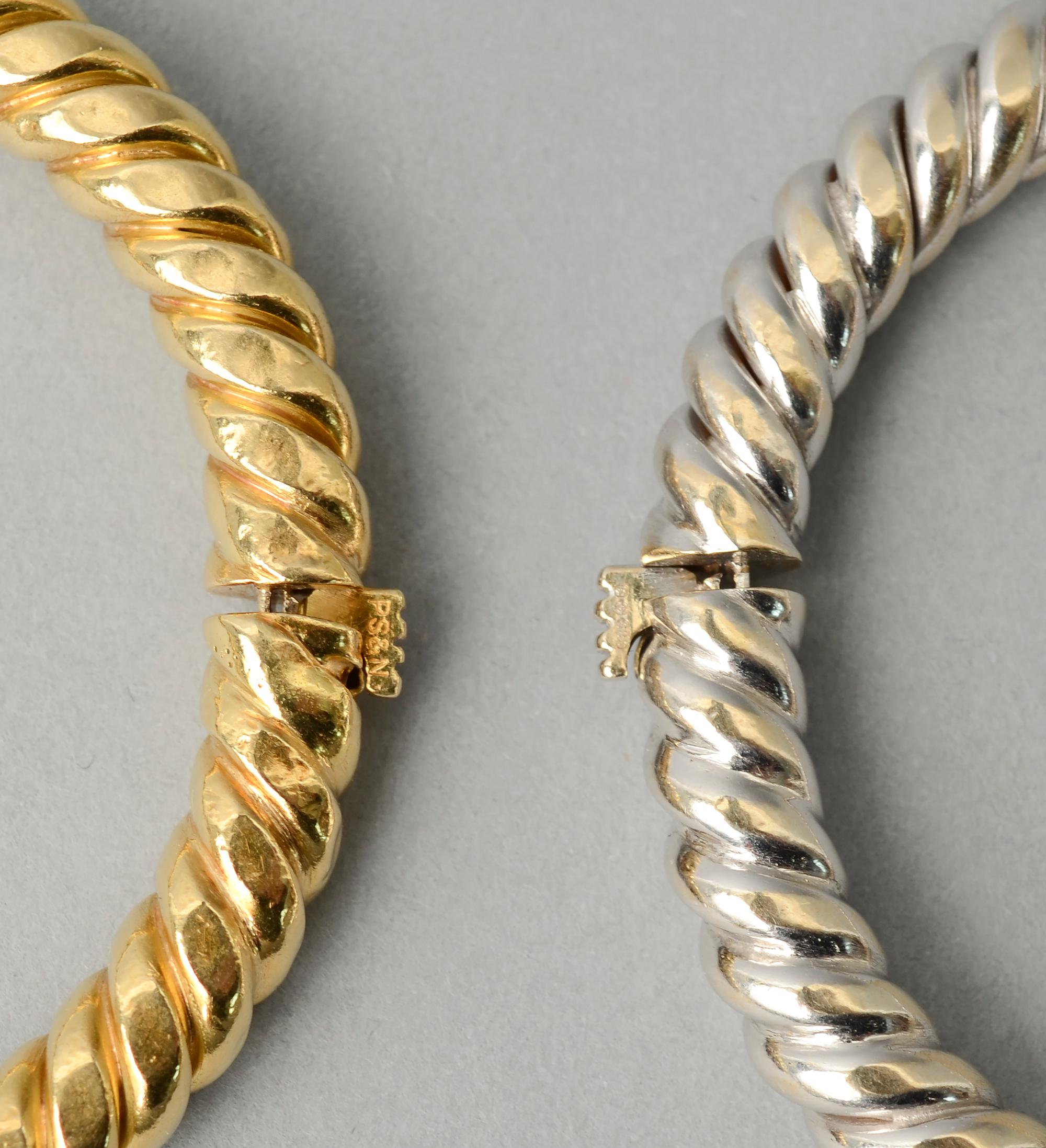 Modern Van Cleef & Arpels Pair of Yellow and White Twisted Gold Bangle Bracelets