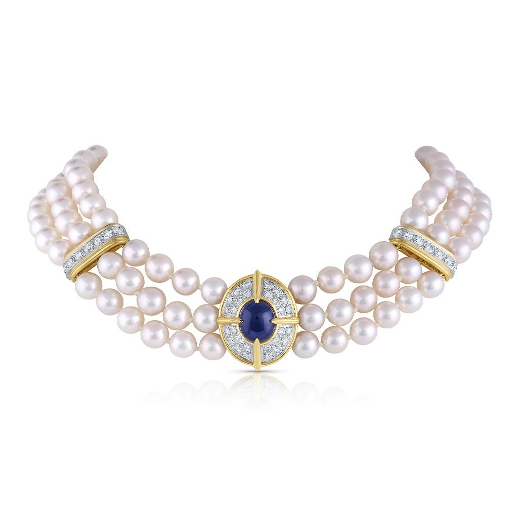 This elegant pearl necklace is crafted of platinum and 18 karat yellow gold. It features a 5 carat sapphire and 49 diamonds weighing 5.95 carat total weight.
Comes with Van Cleef & Arpels Letter of Authenticity.

Year: 1981