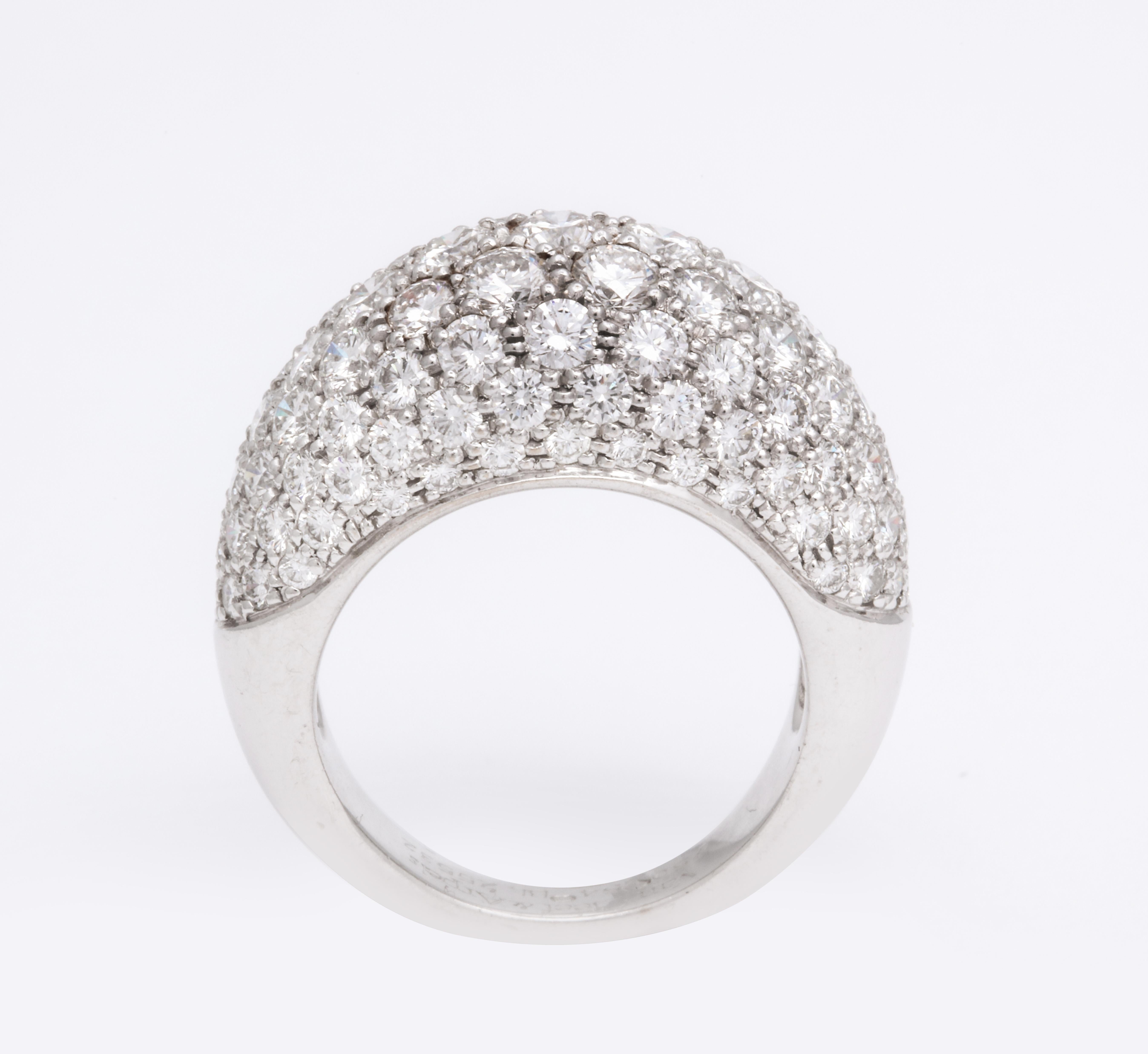 A sexy pave diamond ring (ladies size 7) features approximately 5 carats of very fine quality round brilliant diamonds expertly set in this classic french silhouette, signed Van Cleef & Arpels 