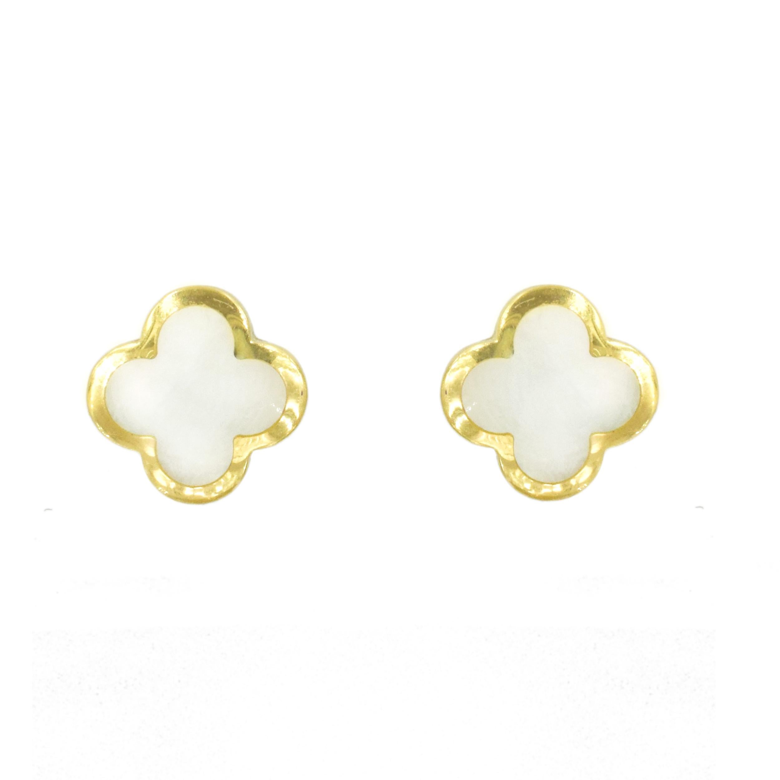 Van Cleef and Arpels Pure Alhambra earrings. The earrings are crafted in
18k yellow gold with center set with white mother of pearl. Diameter: 11mm. Inscribed: VCA,
Au750, JE, 847312. Stamped with makers mark and french hallmark.
 Equipped with