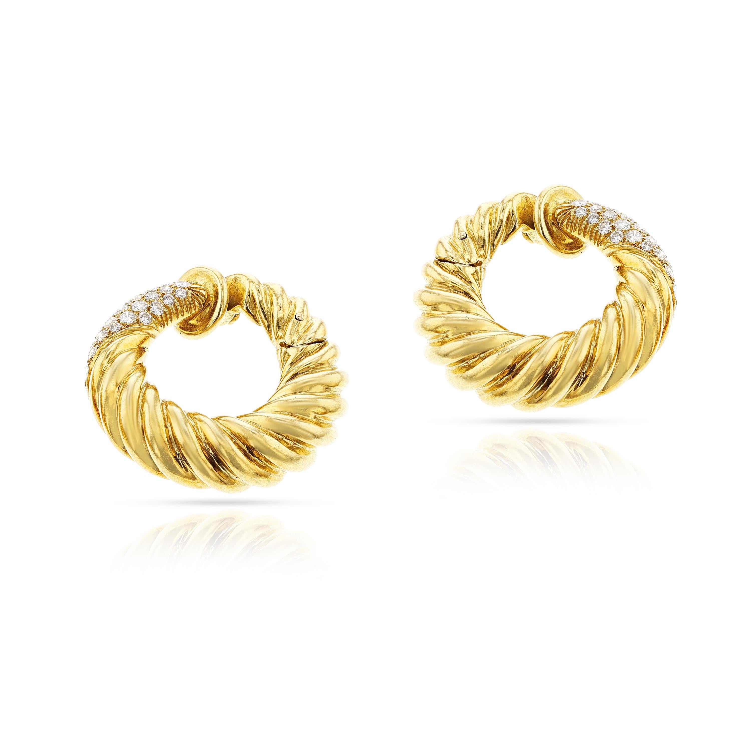 A pair of Van Cleef and Arpels Ropework and Diamond Hoop Earrings made in 18k Yellow Gold. The diamonds weigh appx. 1.60 carats. Signed VCA and numbered B3066A78.