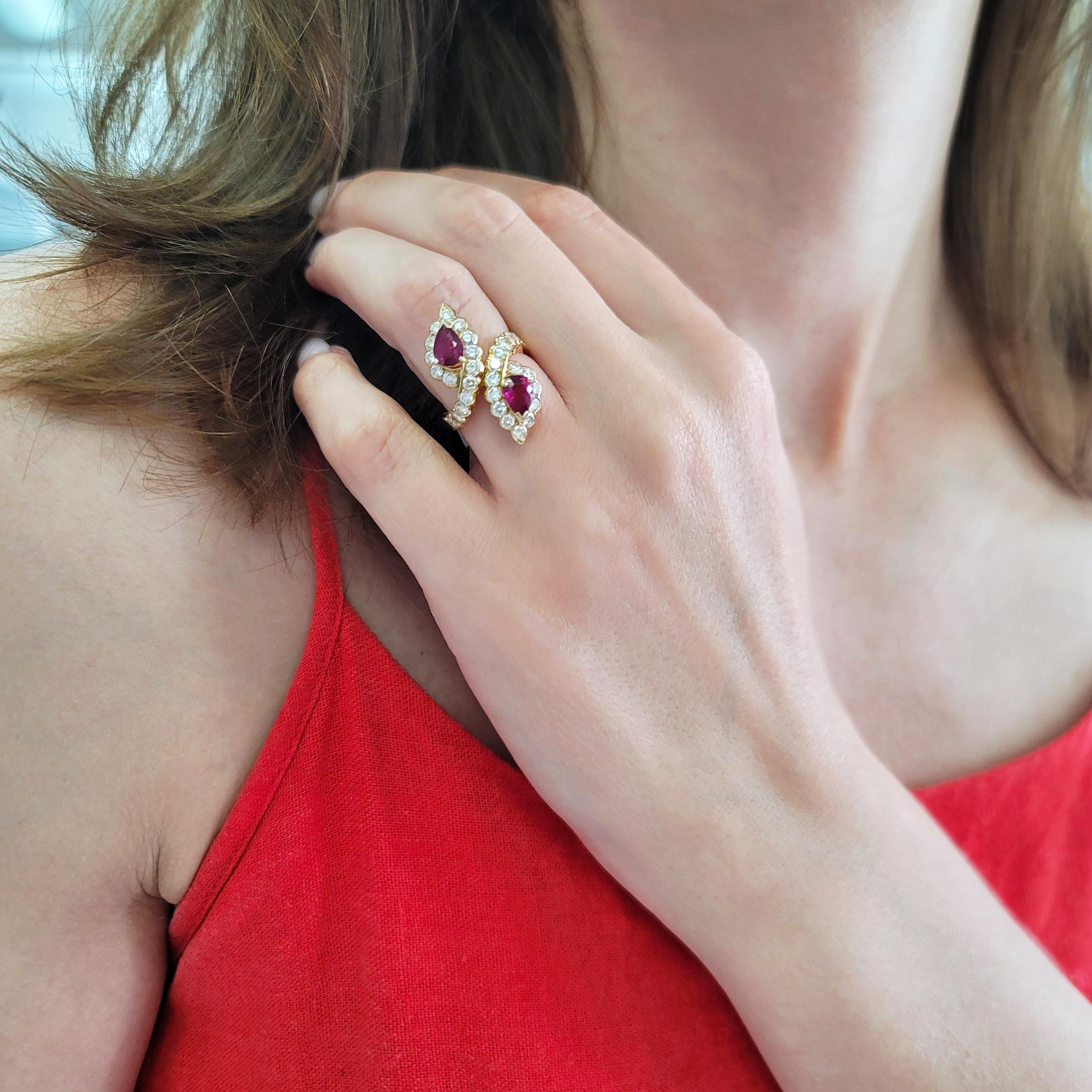 Van Cleef and Arpels Ruby and Diamond Bypass Toi et Moi
Ring This ring has 2 pear shape diamonds estimated to weigh
approximately 1ct each and they ar surrounded by 30
round diamonds weighing a total of approximately 1ct all
set in 18k yellow gold.