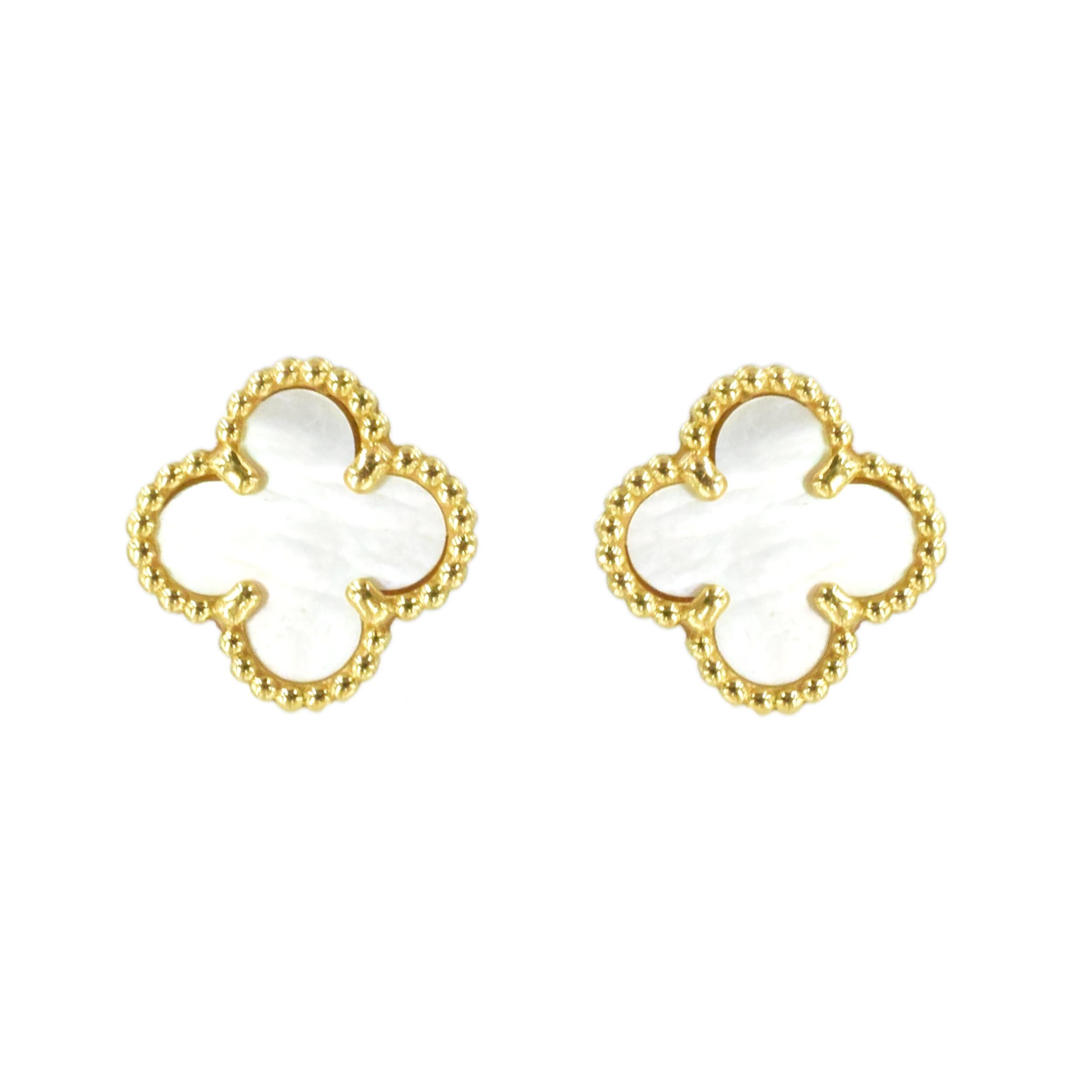 Van Cleef and Arpels Sweet Alhambra ear-stud. The earrings are crafted in
18k yellow gold with center set with white mother of pearl. Diameter: 9mm. Inscribed: VCA,
Au750, JE, 209961. Stamped with makers mark and french hallmark. Equipped with