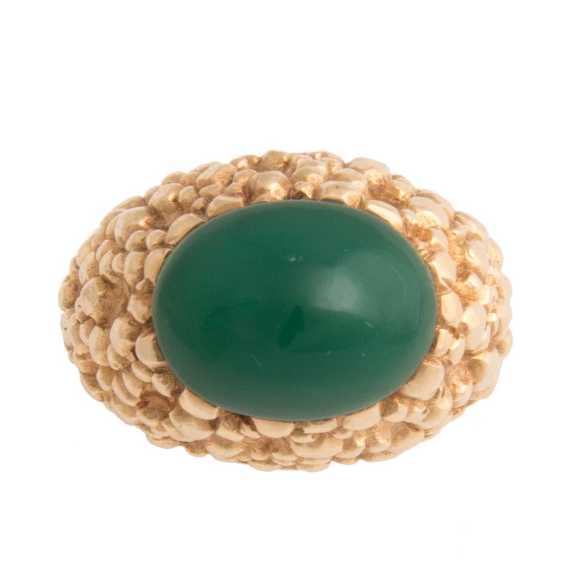 Van Cleef & Arpels ring, textured 18k gold with a Chrysoprase cabochon.
Ring size 6.5
Signed VCA, marked OR750, makers mark, French hallmark
Circa 1970s