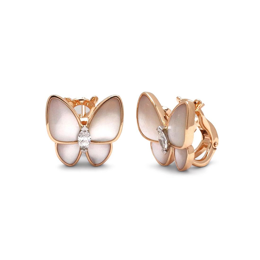 Authentic Van Cleef & Arpels 'Two Butterfly' earrings crafted in 18 karat rose gold.  Each butterfly is set with white mother-of-pearl and a single marquise cut diamond with an estimated 0.31 total carat weight for the pair. Signed VCA, Au750 with