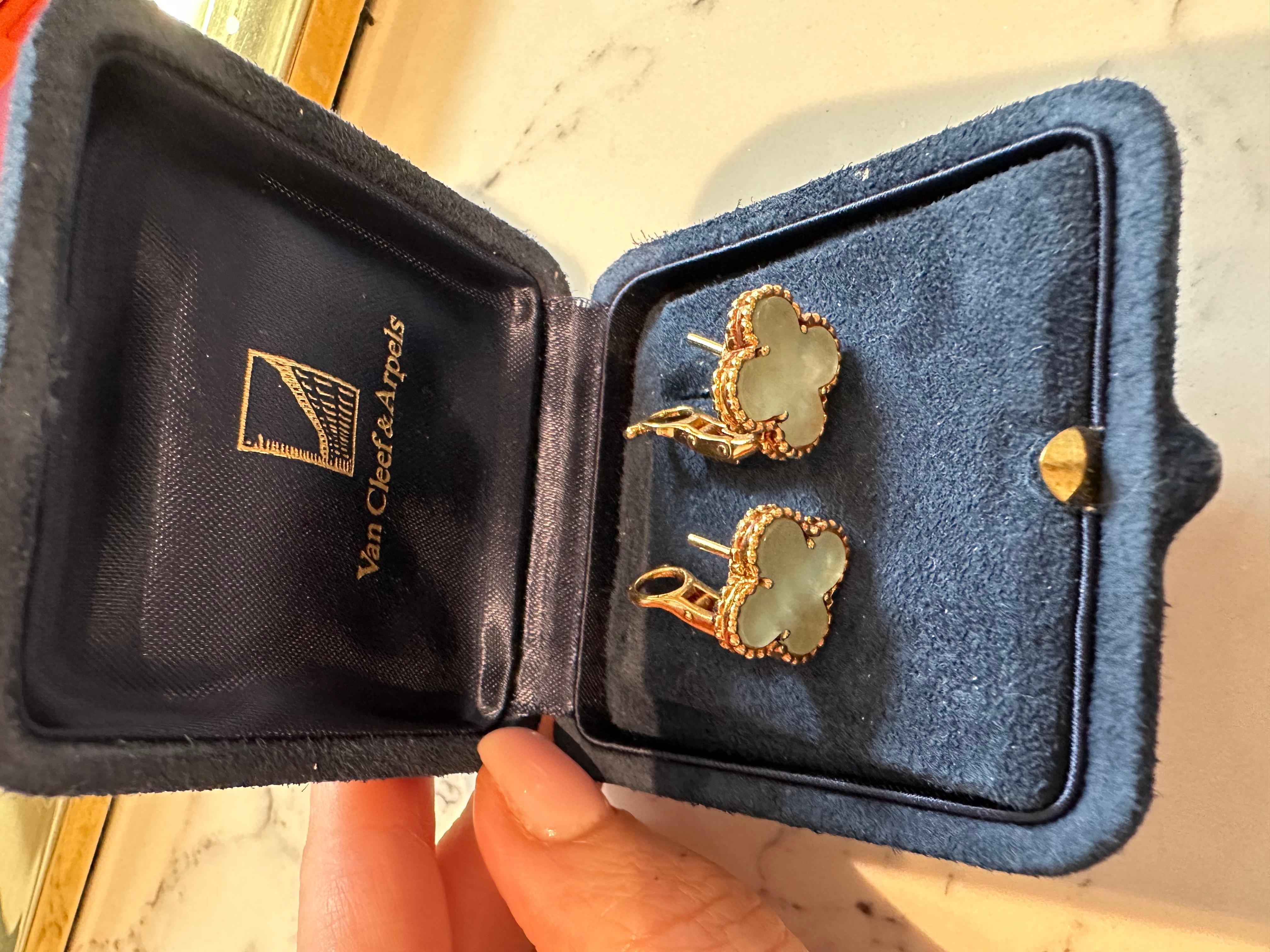 VAN CLEEF & ARPELS VINTAGE ALHAMBRA 18K GOLD JADE EARRINGS 
Van Cleef and Arpels earrings from the Vintage Alhambra collection feature jade set in 18K gold. 
The Jade gemstone makes it so rare and valuable.  Measure 14.7mm x 14.4mm. Marked VCA, 750.
