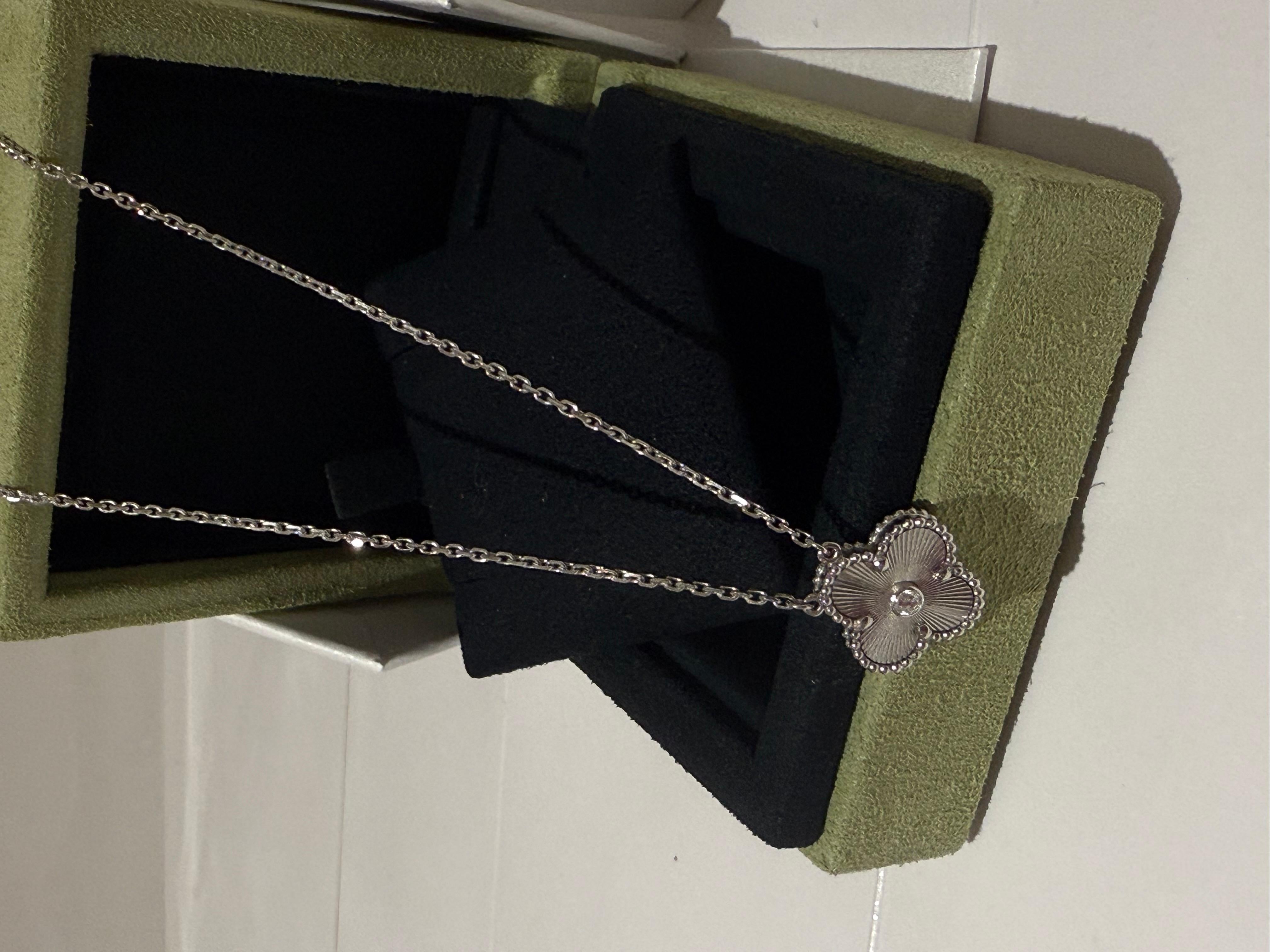 Van Cleef and Arpels White Gold Guilloche Diamond holiday pendant 2020 For Sale 1