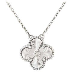 Van Cleef and Arpels White Gold Guilloche Diamond holiday pendant 2020