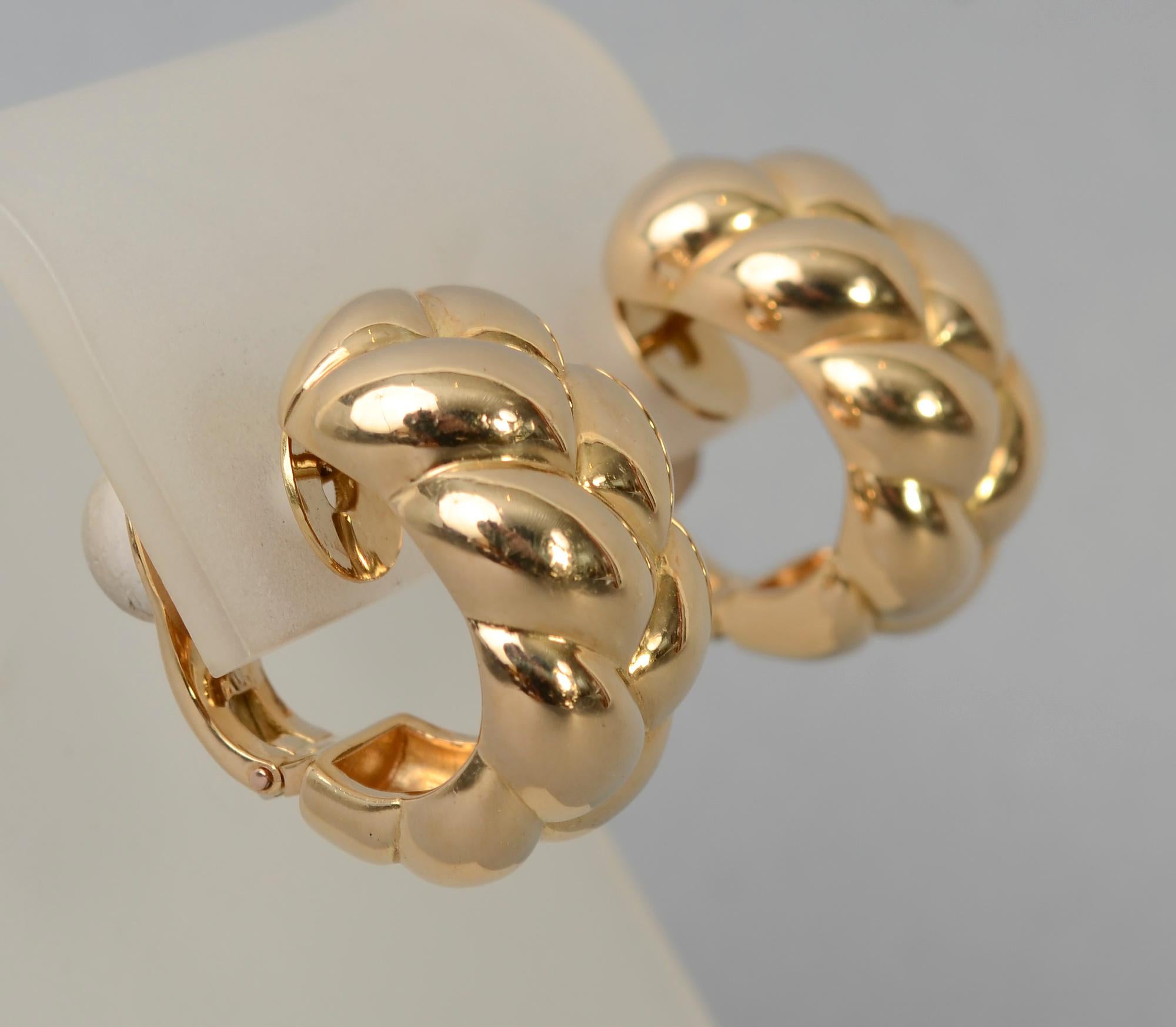 Van Cleef and Arpels 18 karat gold hoop earrings made to look braided. The backs are posts and clips with original rubber pads for comfort.
The earrings are 5/8