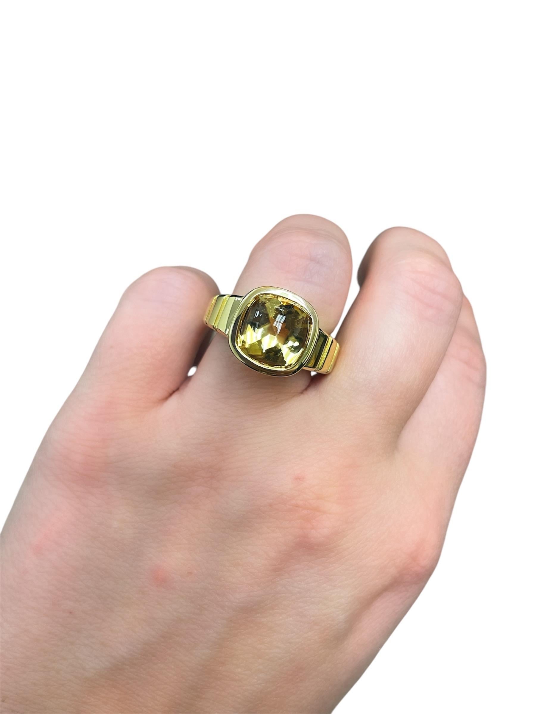 This classic ring by Van Cleef & Arpels features a beautiful buff top citrine with checkerboard faceting underneath creating a gorgeous effect in the stone.

Metal: 18K
Ring size: 7 3/4
Stamp: VCA NY5K782-72 
Gross weight: 13.40 grams