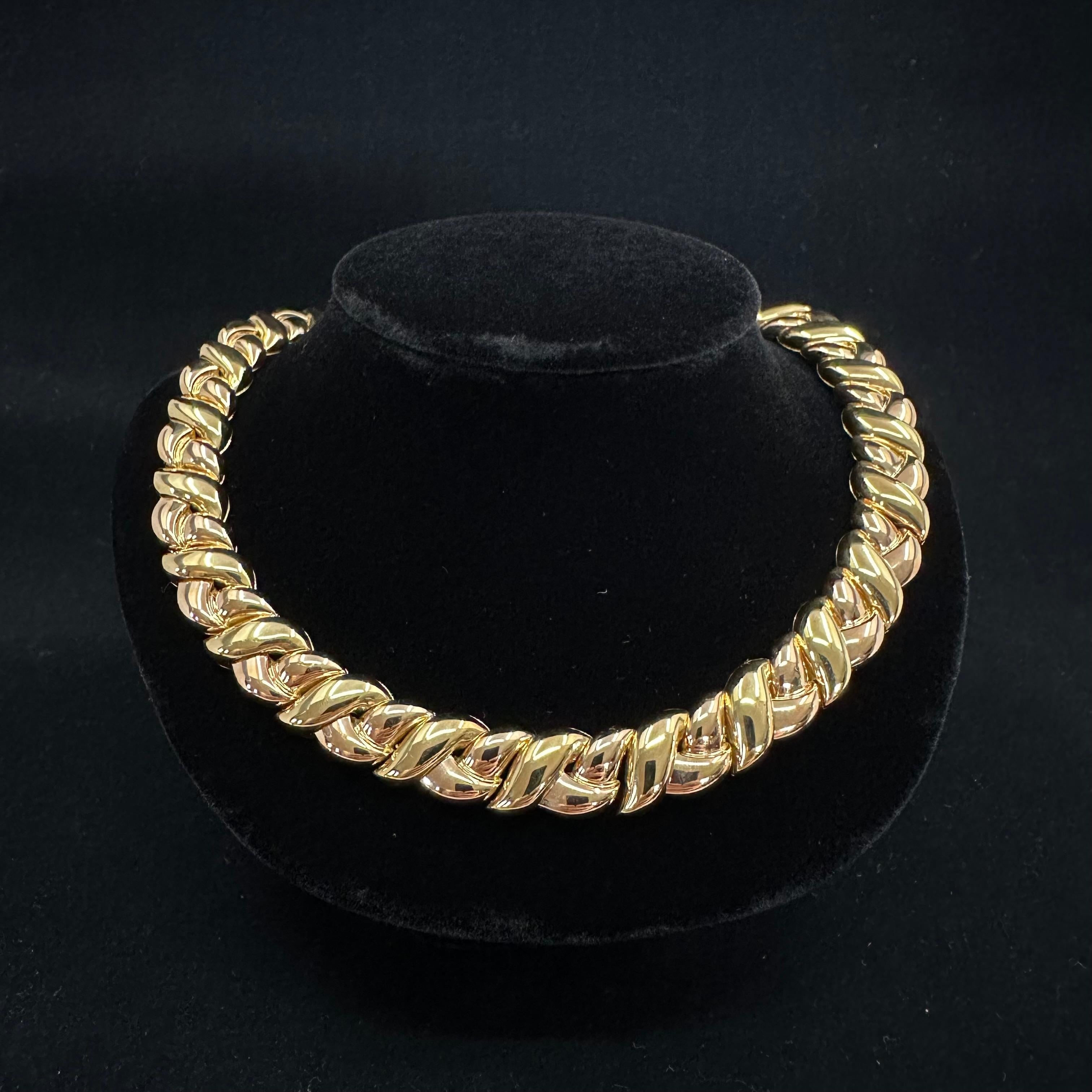 Vintage 1980s Van Cleef and Arpels yellow gold choker necklace. This variation is for a medium size neckline the necklace is 16 inches in length and 11 millimeters in with contour links of 18 karat yellow gold hallmark Van Cleef and Arpels with