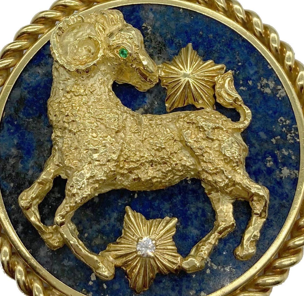 A classic Van Cleef and Arpels Zodiac pendant in 18 karat gold, sodalite, diamond, and emerald. The sodalite panel depicts Aries, and can be rotated as desired.