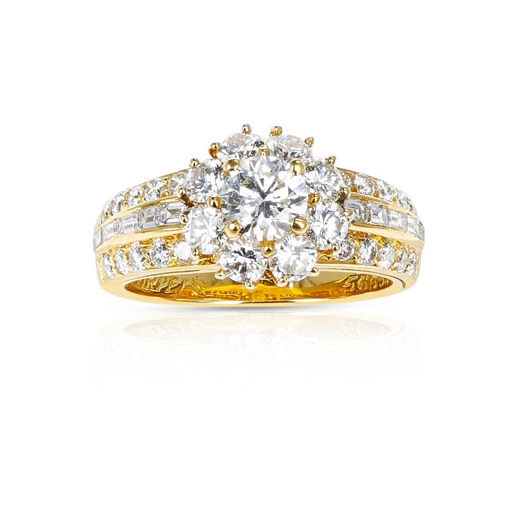 A bold and beautiful Van Cleef & Arpels 0.50 ct. Center Diamond with 2 cts. accenting Diamonds Floral Ring. The ring size is US 6. The total weight of the ring is 5.97 grams. 

SKU: 714-FREJYJL