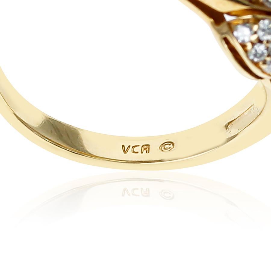 Van Cleef & Arpels 0.55 Carat Oval Diamond Ring Accented with Diamonds, 18K Gold In Excellent Condition In New York, NY