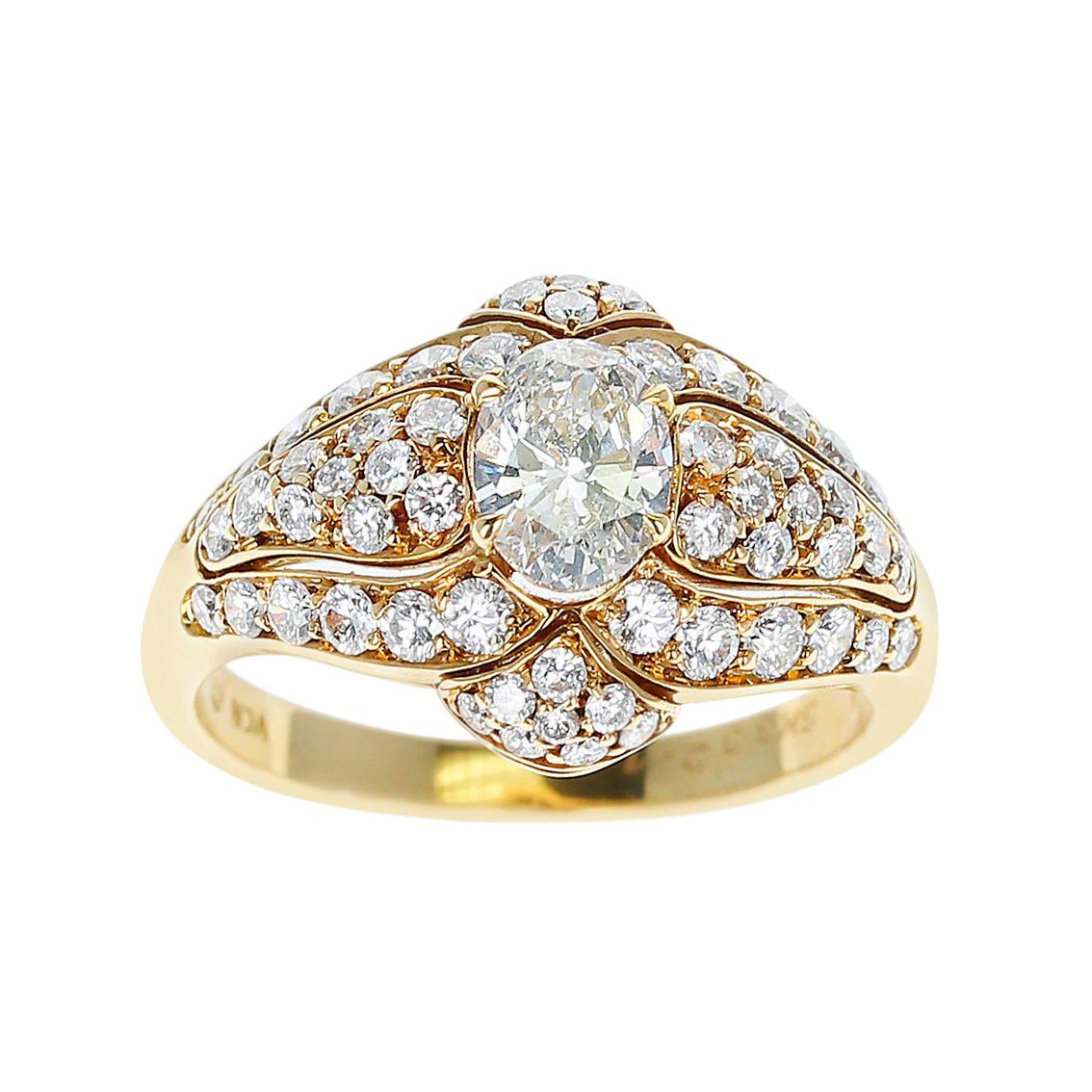 Van Cleef & Arpels 0.55 Carat Oval Diamond Ring Accented with Diamonds, 18K Gold