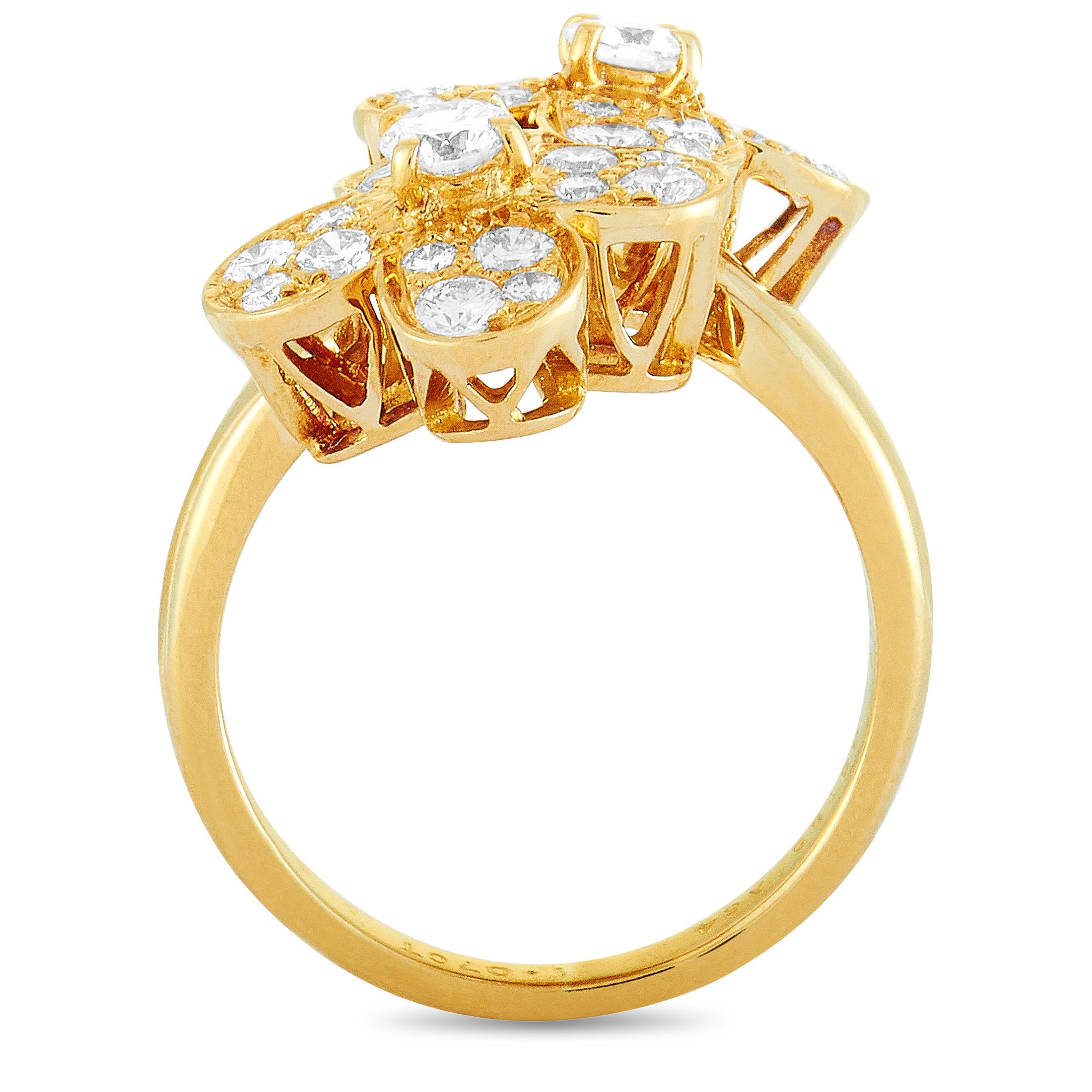 This Van Cleef & Arpels ring is made out of 18K yellow gold and diamonds that total 1.07 carats and feature grade F color and VS1 clarity. The ring weighs 6.1 grams, boasting band thickness of 2 mm and top height of 8 mm, while top dimensions