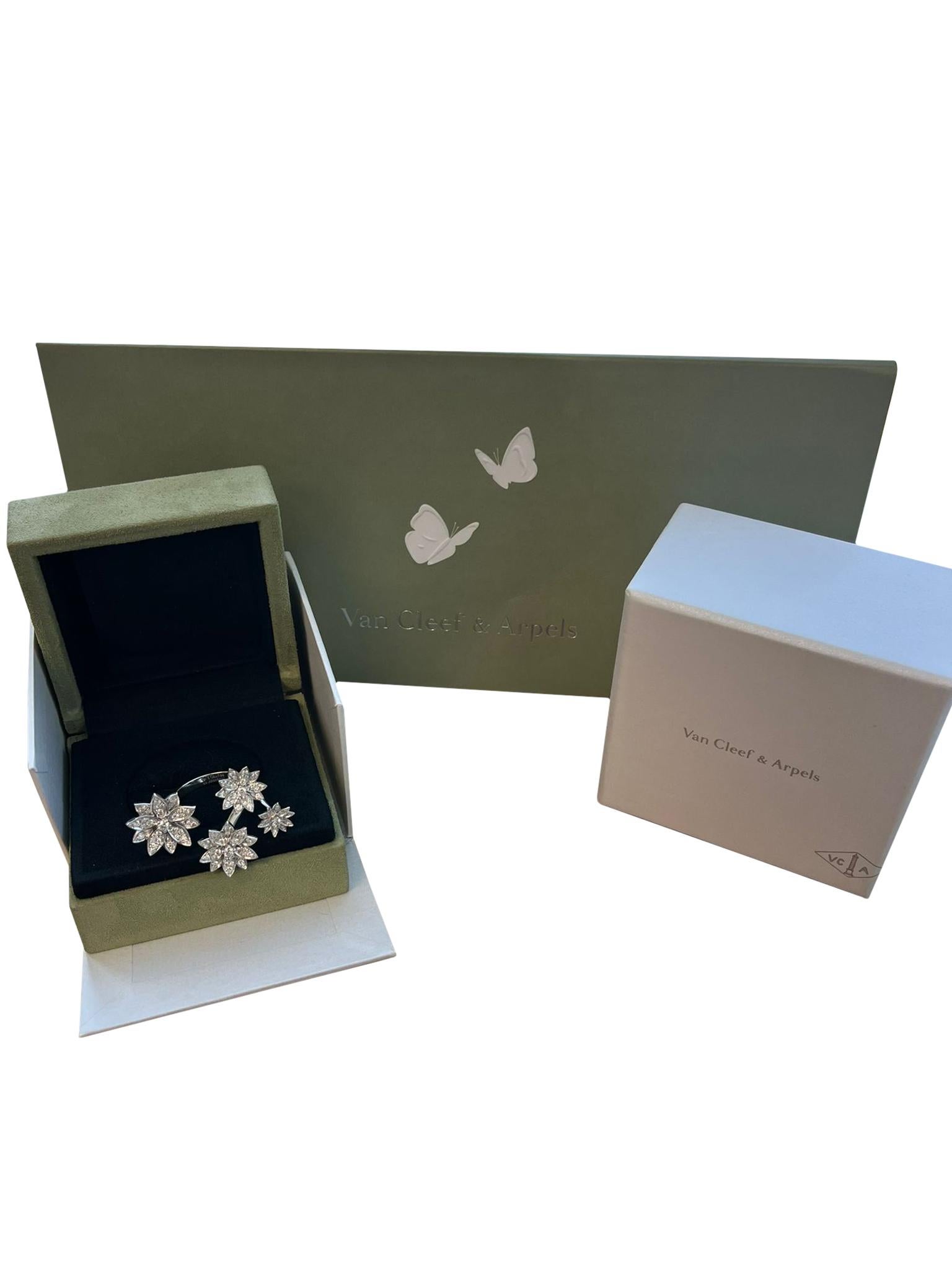 Van Cleef & Arpels 1.18ct Lotus Between the Finger 4 Flowers Ring 18K White Gold In New Condition For Sale In Aventura, FL
