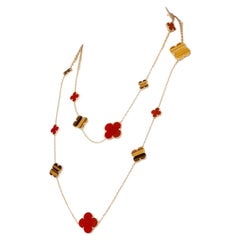 Van Cleef & Arpels 16 motifs Magic Alhambra tiger eye and carnelian