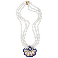 Collier Van Cleef & Arpels en or 18 carats 0,82 carat de diamants Lapis, corail et MOP