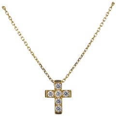 Van Cleef & Arpels Collier pendentif croix en or 18 carats avec diamants 0::24 carat