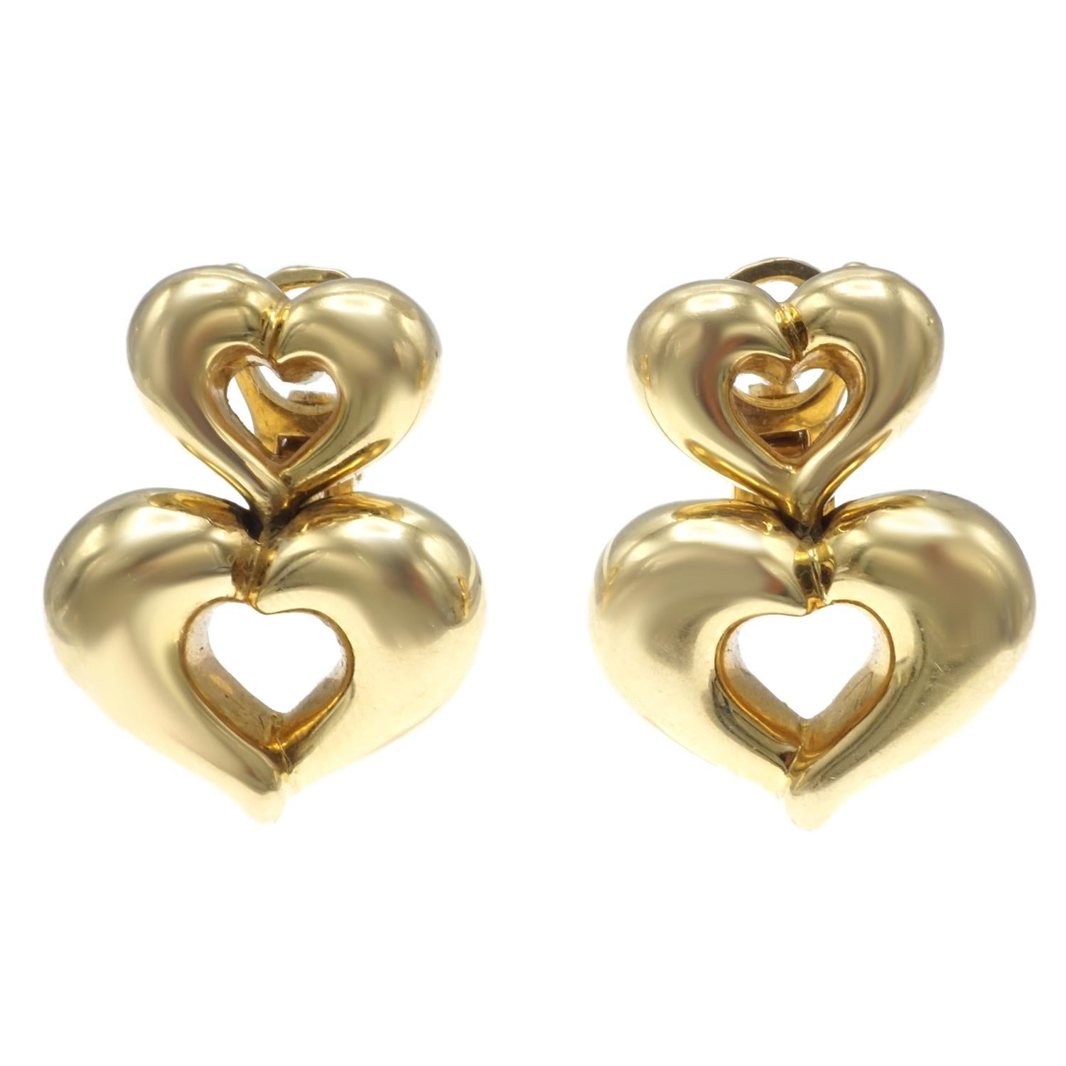 Crafted in 18 karat yellow gold double heart shaped earrings are signed V.C.A. stamped 750 CR03.04YG65.  Weigh 17.1 gr./11.0 dwt. Dimensions L 7/8