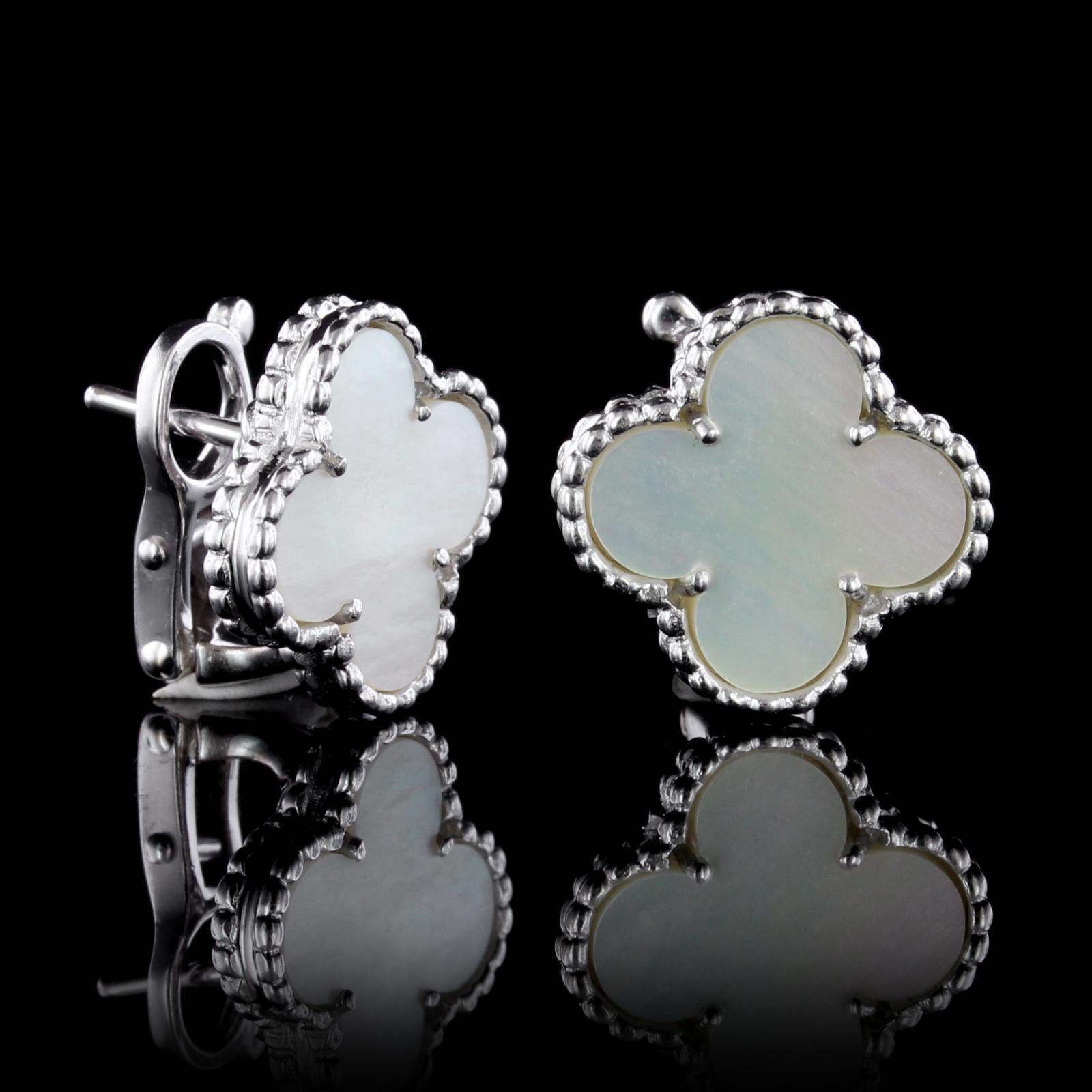 Van Cleef & Arpels 18K White Gold Mother of Pearl Alhambra Earrings. The earrings are set with clover shaped mother of pearl, # BL 151404, French eagle stamp, diameter 14.50mm., with original pouch.