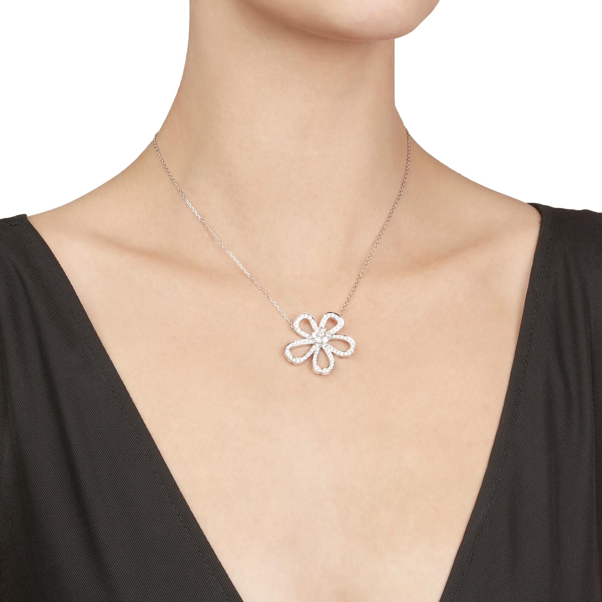This Necklace by Van Cleef & Arpels is from their Flowerlace collection and features 78 round brilliant cut Diamonds of 2.37ct total colour E-F, clarity VVS, made in 18k White Gold. The Necklace has a secure lobster clasp. Complete with Van Cleef &