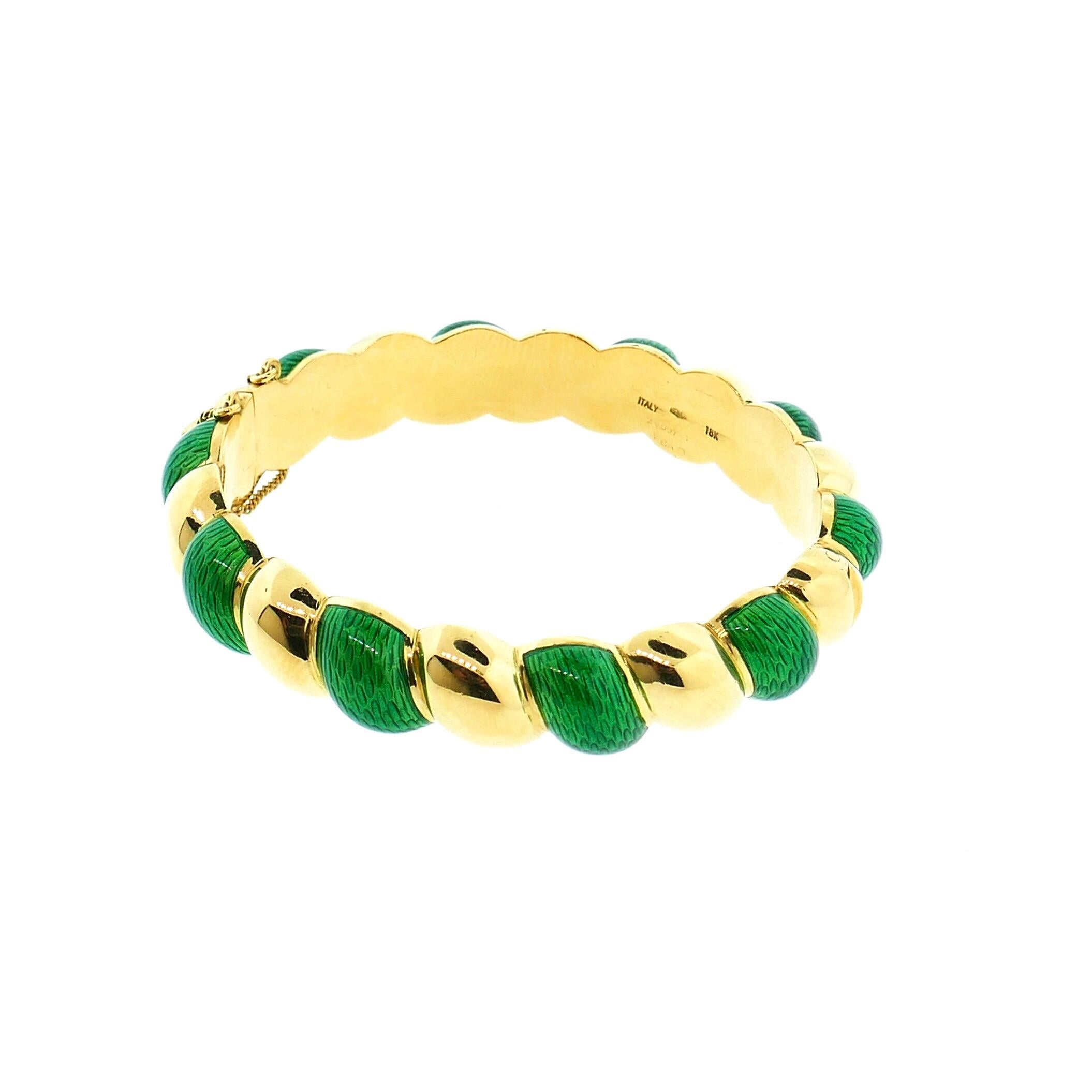 Van Cleef & Arpels 18 Karat Yellow Enamel Bangle

This is a beautiful Van Cleef & Arpels bangle that features stunning green enamel work. Very wearable and chic!   

Weight: 49.5 Grams 

Size: Will Comfortably Fit a 6.5