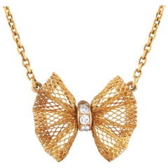 Van Cleef & Arpels 18 Karat Yellow Gold 0.10 Carat Diamond Lace Bowtie Necklace