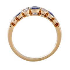 Van Cleef & Arpels 18 Karat Yellow Gold Diamond and 3-Sapphire Band Ring