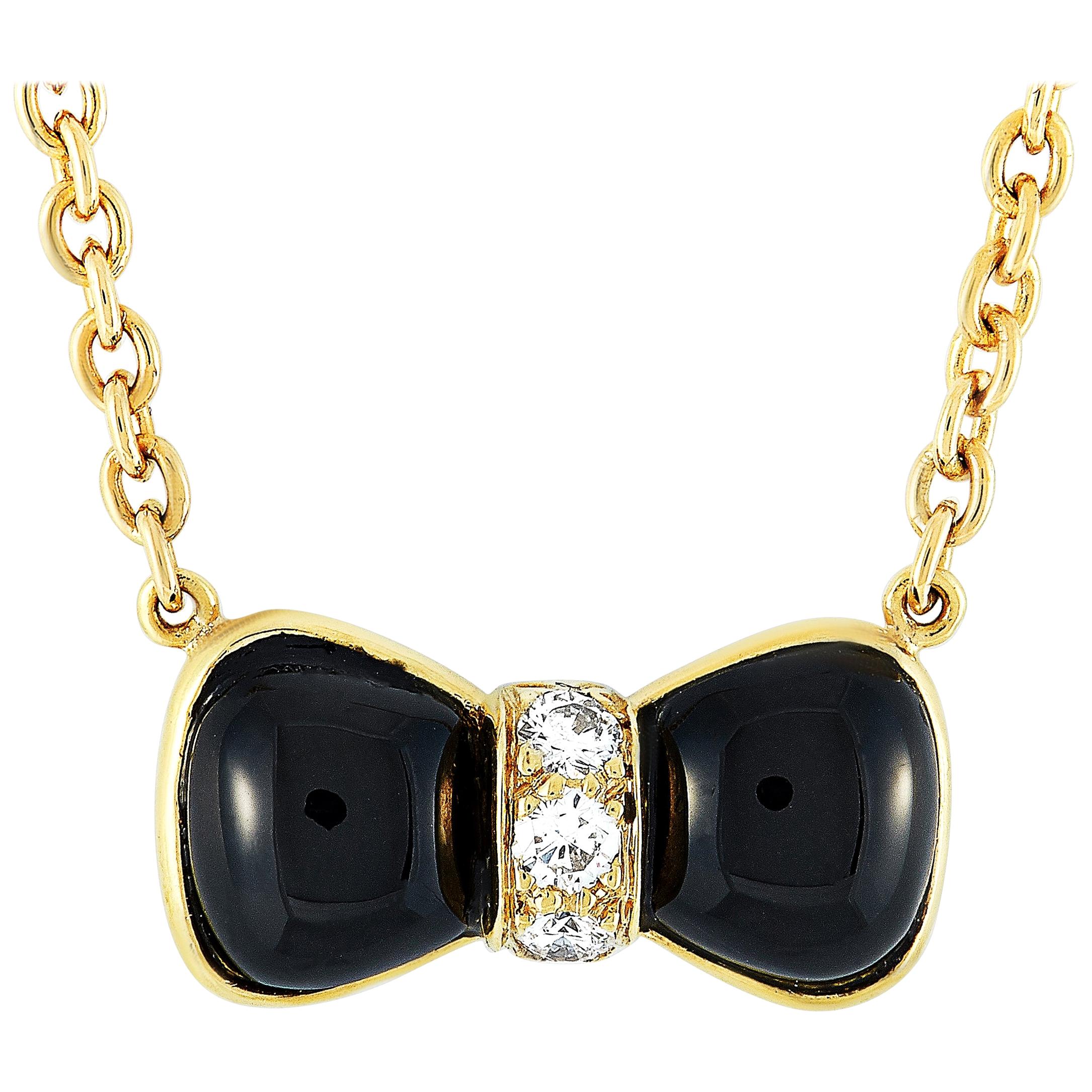 Van Cleef 
Arpels 18 Karat Yellow Gold Diamond and Onyx Bow Pendant Necklace