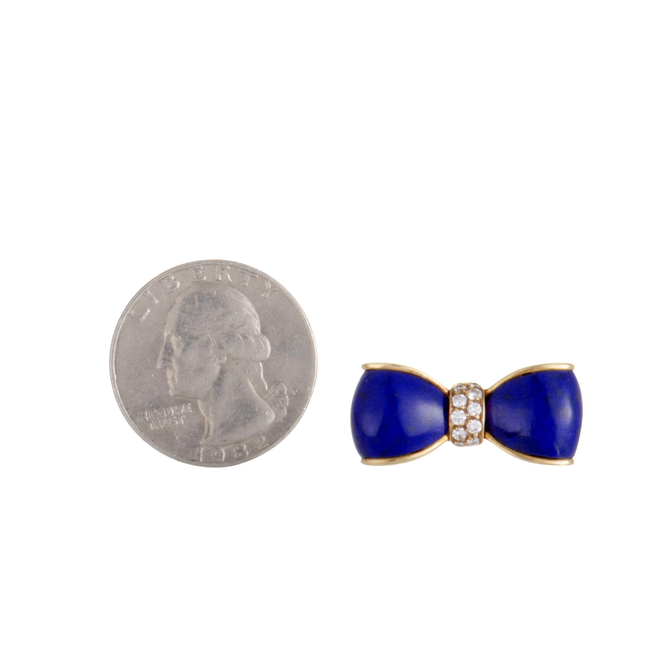 Add a wonderfully feminine touch to your style with this beautiful Van Cleef & Arpels brooch that is made in the form of a charming bow. The brooch is crafted from 18K yellow gold and embellished with lapis lazuli and 0.19 carats of diamond stones.