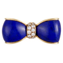 Van Cleef & Arpels 18 Karat Yellow Gold Diamond Pave and Lapis Bow Brooch