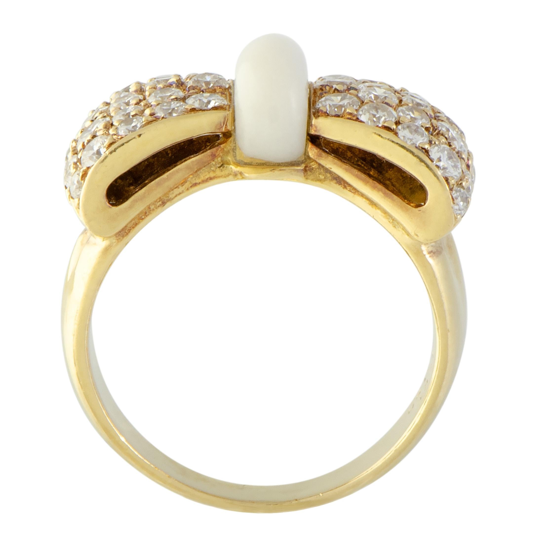 Given a gorgeously feminine appeal by the beautifully stylized and splendidly decorated bow motif, this exceptional 18K yellow gold ring from Van Cleef & Arpels will add a charming accent to any ensemble of yours. The ring is embellished with a