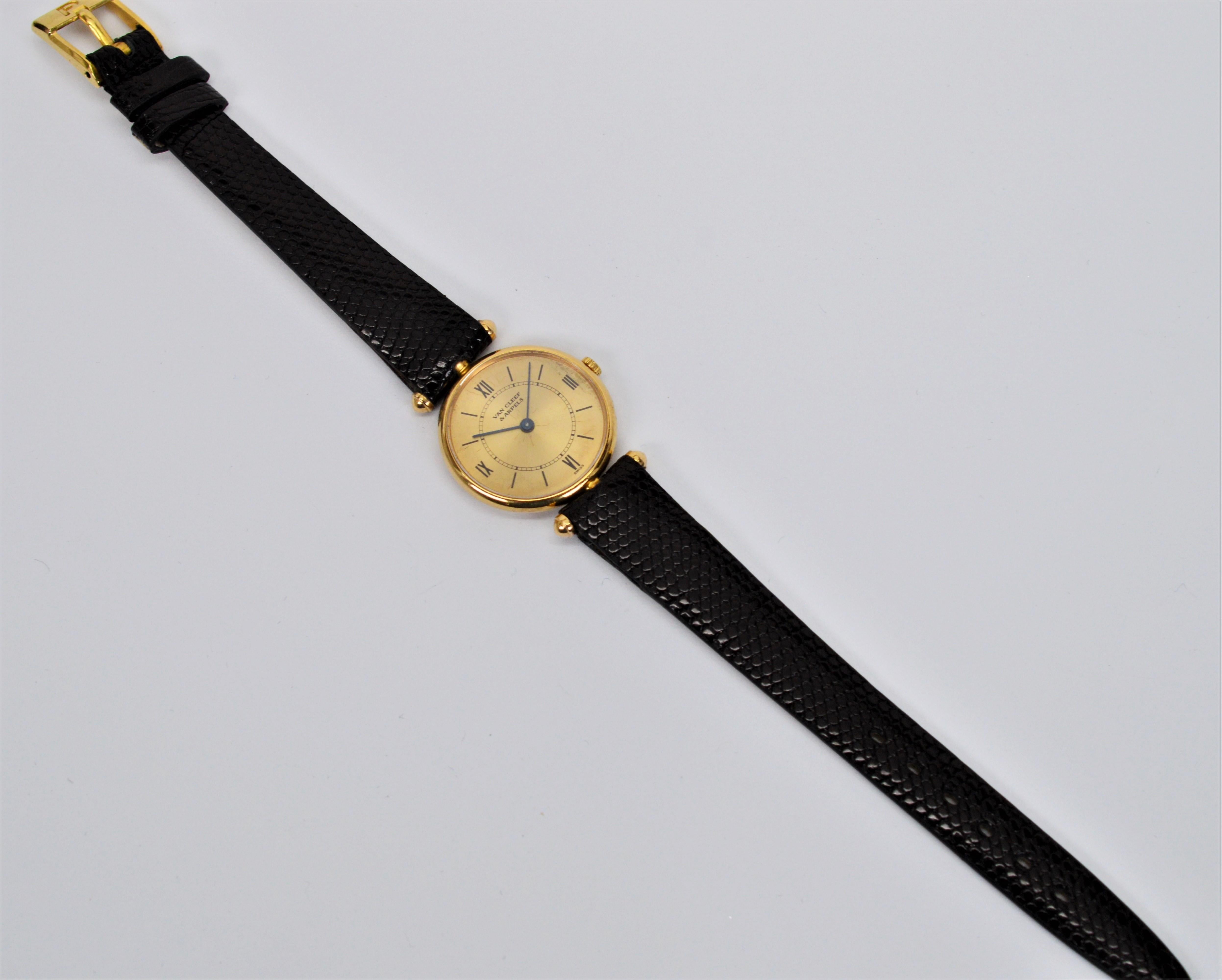 Truly stylish, this Van Cleef & Arpels Ladies Classique Wrist Watch has an attractive slender design in 18 karat yellow gold.  The original champagne dial on this Van Cleef & Arpels  wrist watch has a sapphire crystal,  Roman numerals and matchstick